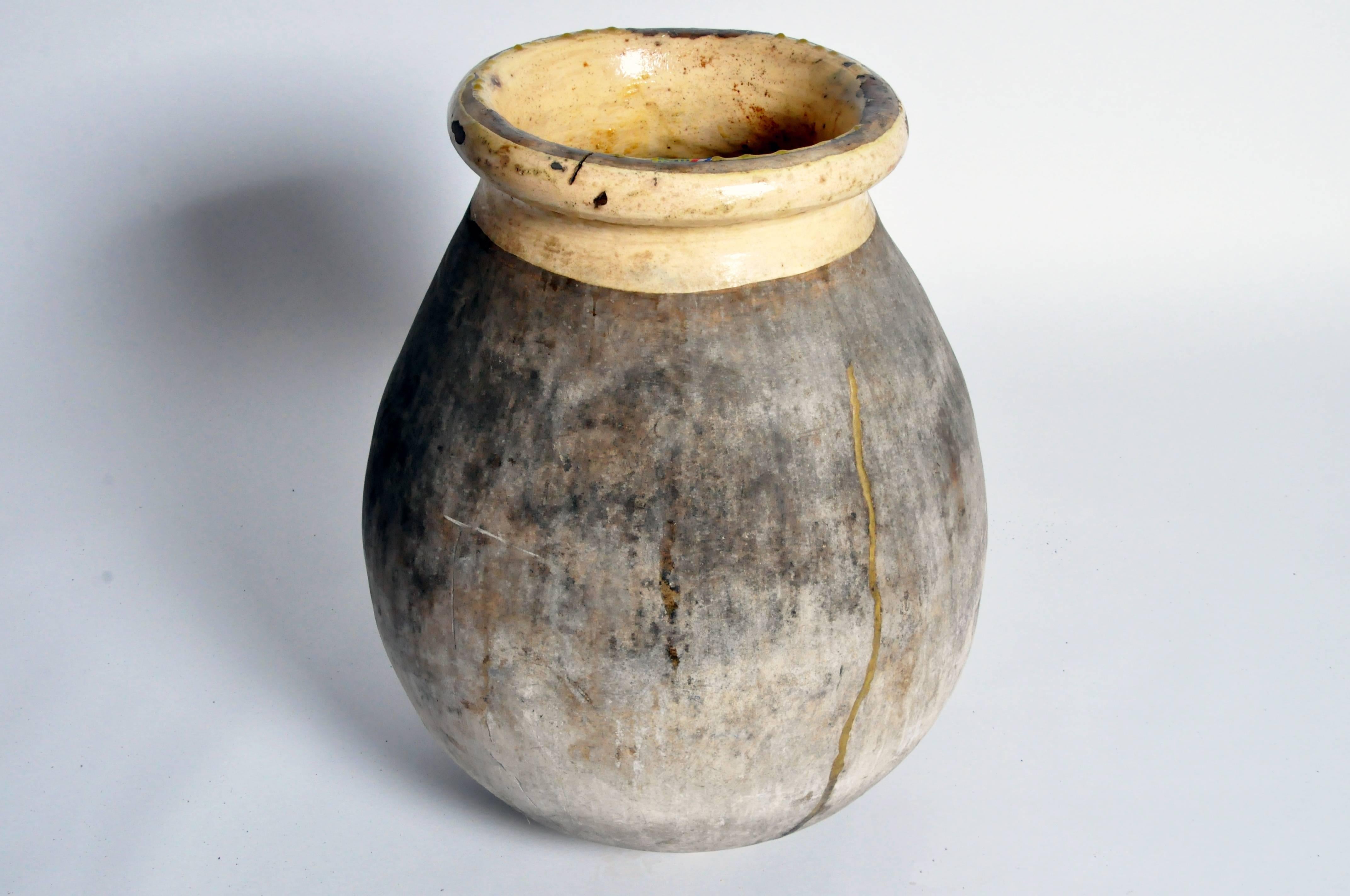 This olive jar is from Provence France and is made from glazed earthenware, circa 1880.