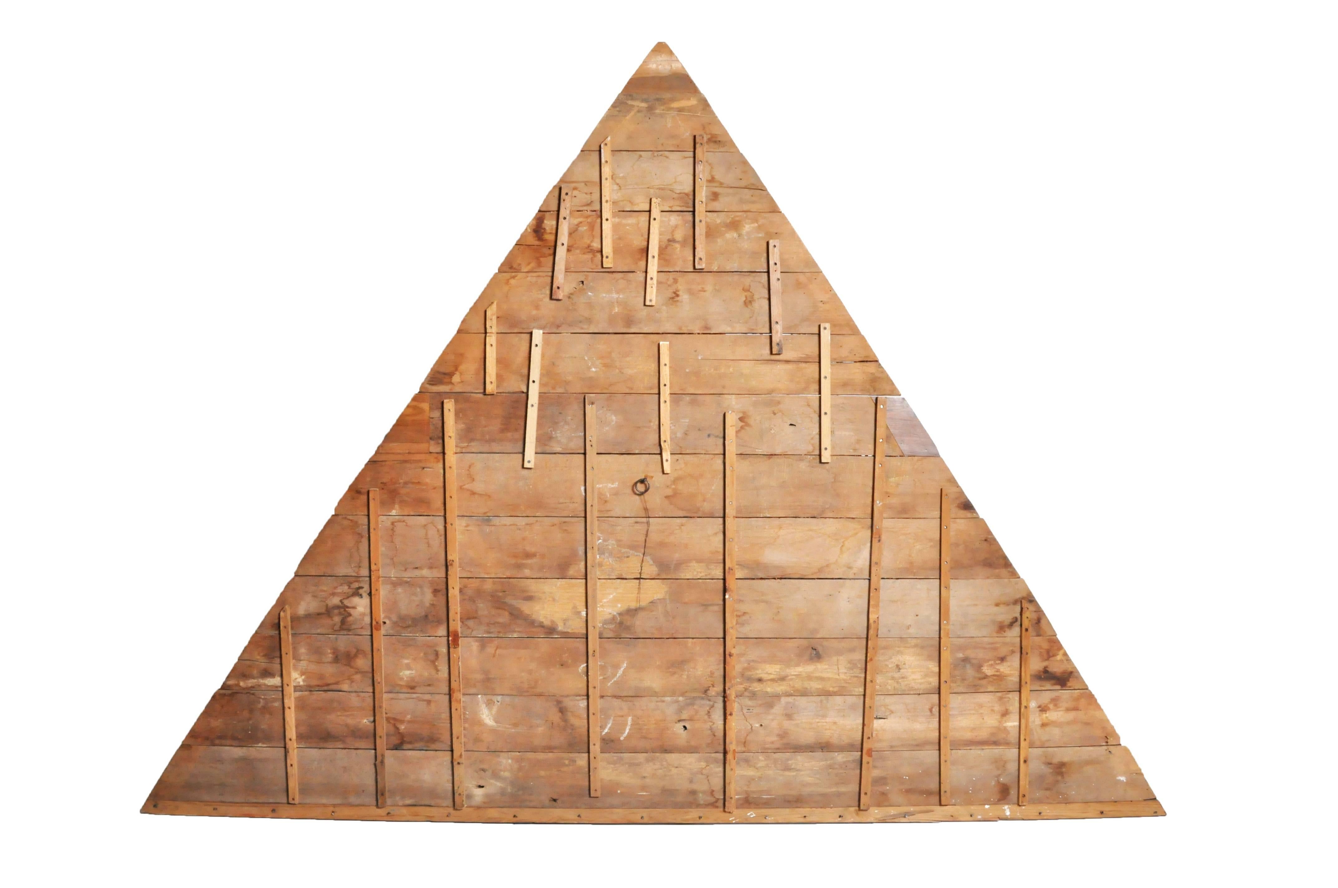 This giant architectural element once graced the pediment of a Northern Thai temple.  It is from Chiang, Mai, Thailand and entirely  made from Teakwood, which is naturally resistant to insects and moisture.  Old Thai temples were mostly made from