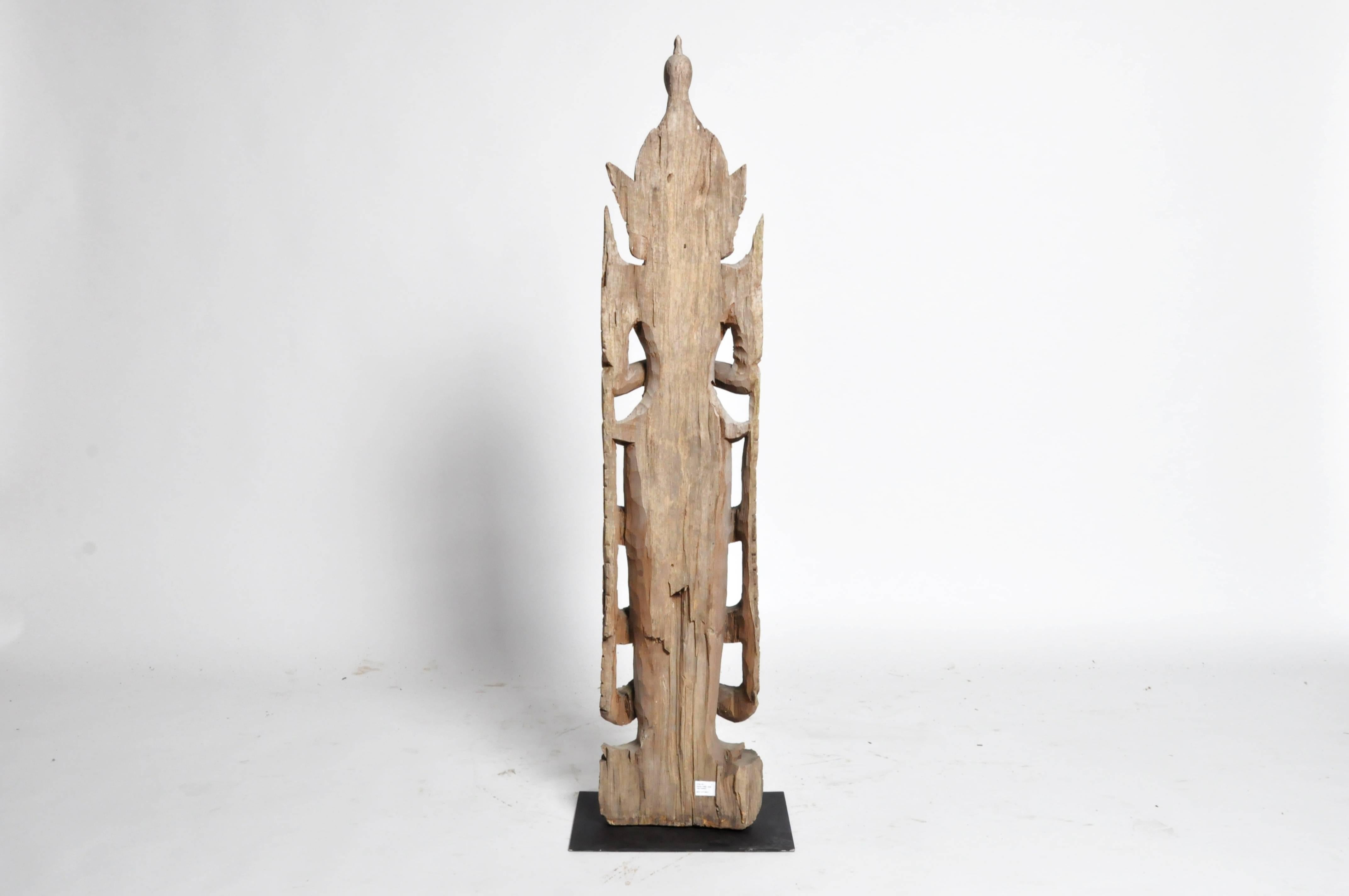 This beautiful wooden greeting angel sculpture is from Thailand and is made from teak wood.

Thai Buddhists, like members of many other faiths and cultures, believe that benign heavenly beings (angels) inhabit the heavens and intercede in the