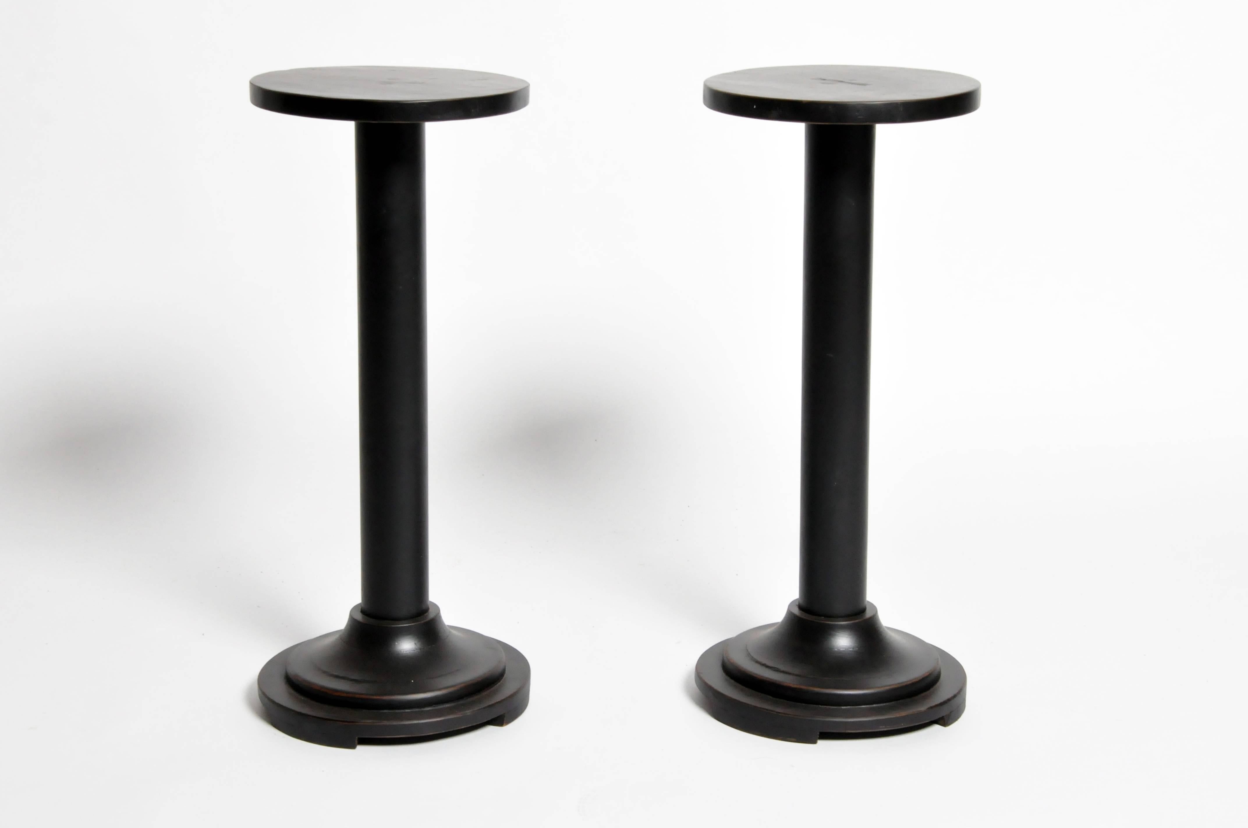 These small round wooden stands are from Rangoon, Burma and are made from teak wood, circa 1950.