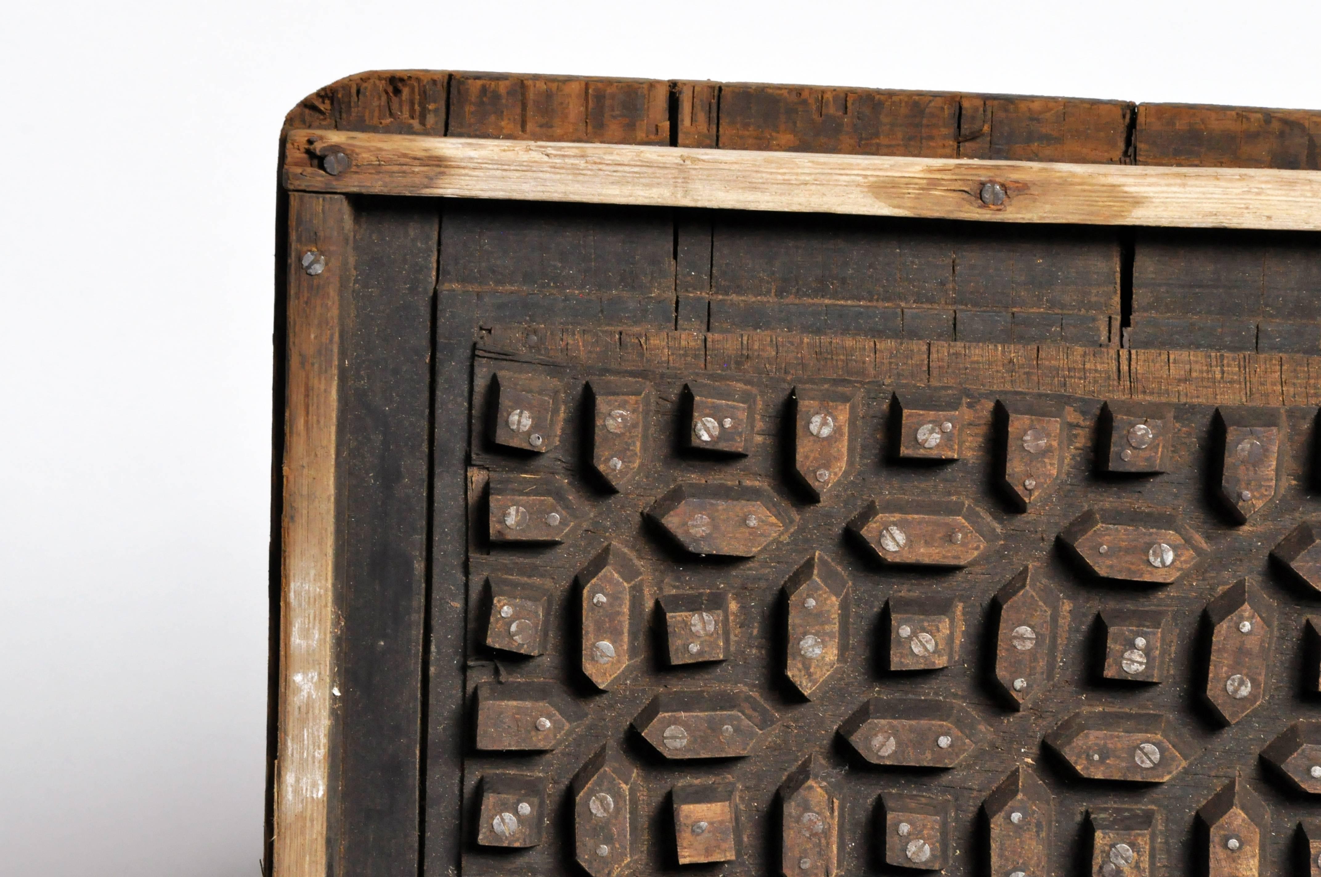 This wooden cement mold is from India and was made from softwood, circa 1960.