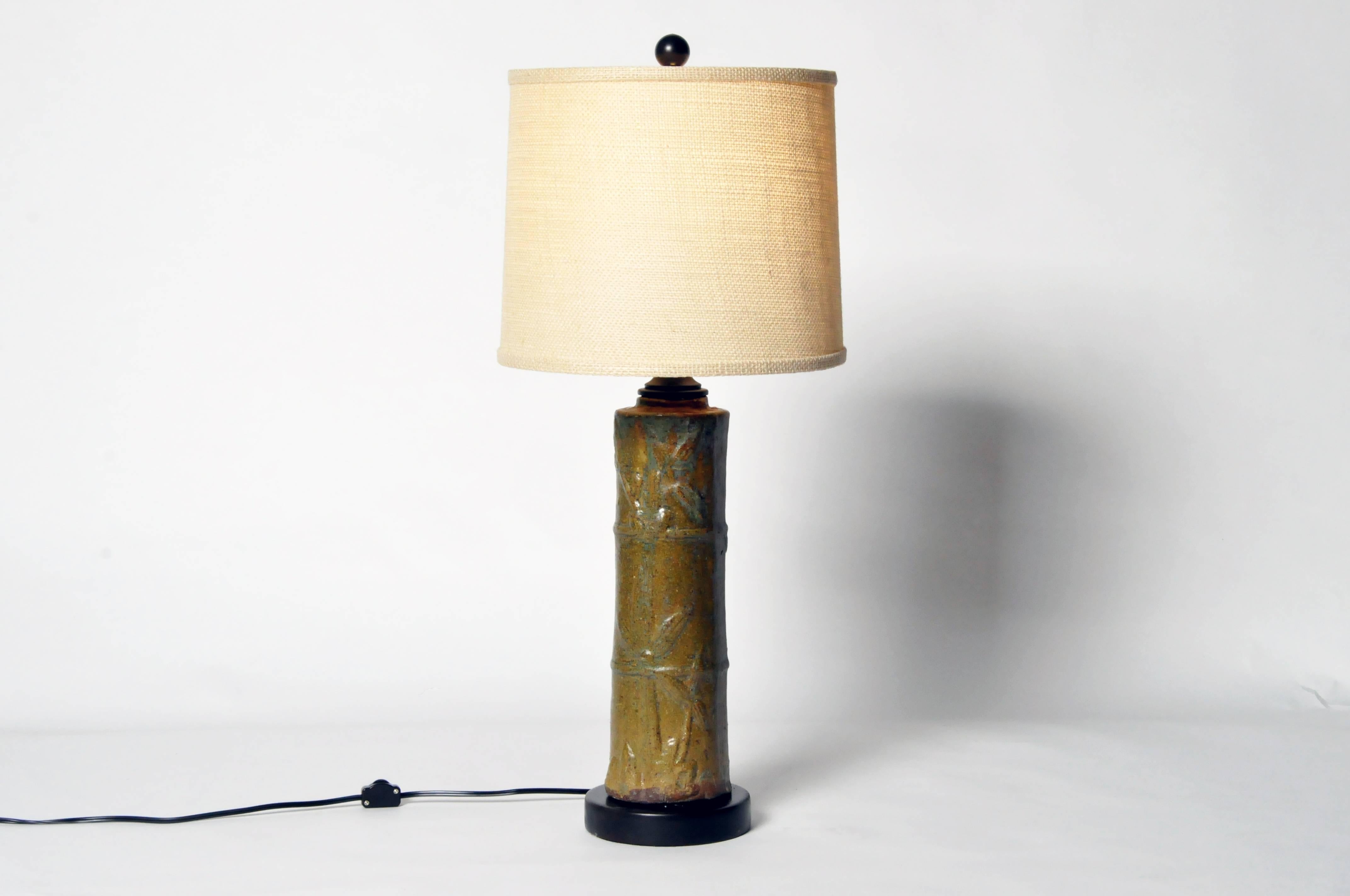 This ceramic bamboo trunk is from Vietnam and they have been converted to lamps. It has been wired for use in the U.S. 
