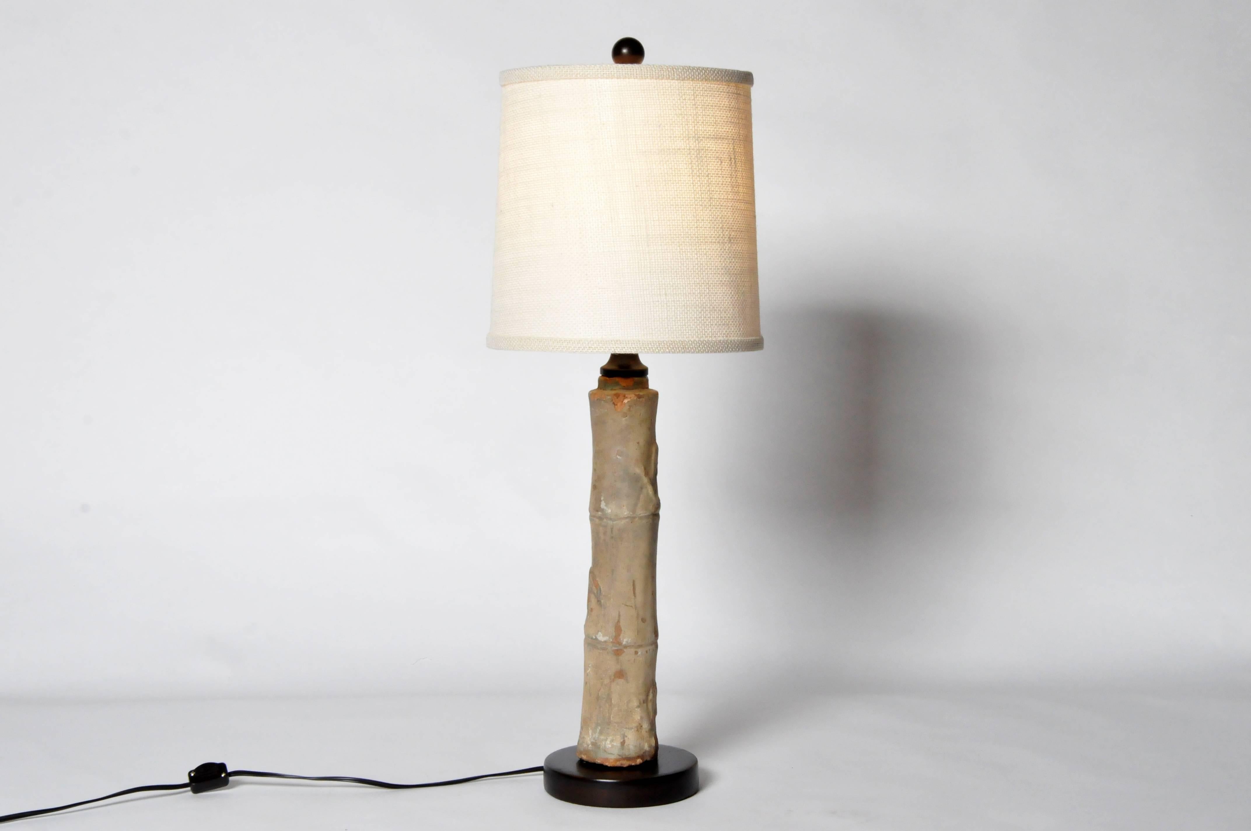 This ceramic bamboo trunk is from Vietnam and they have been converted to lamps. It has been wired for use in the U.S.