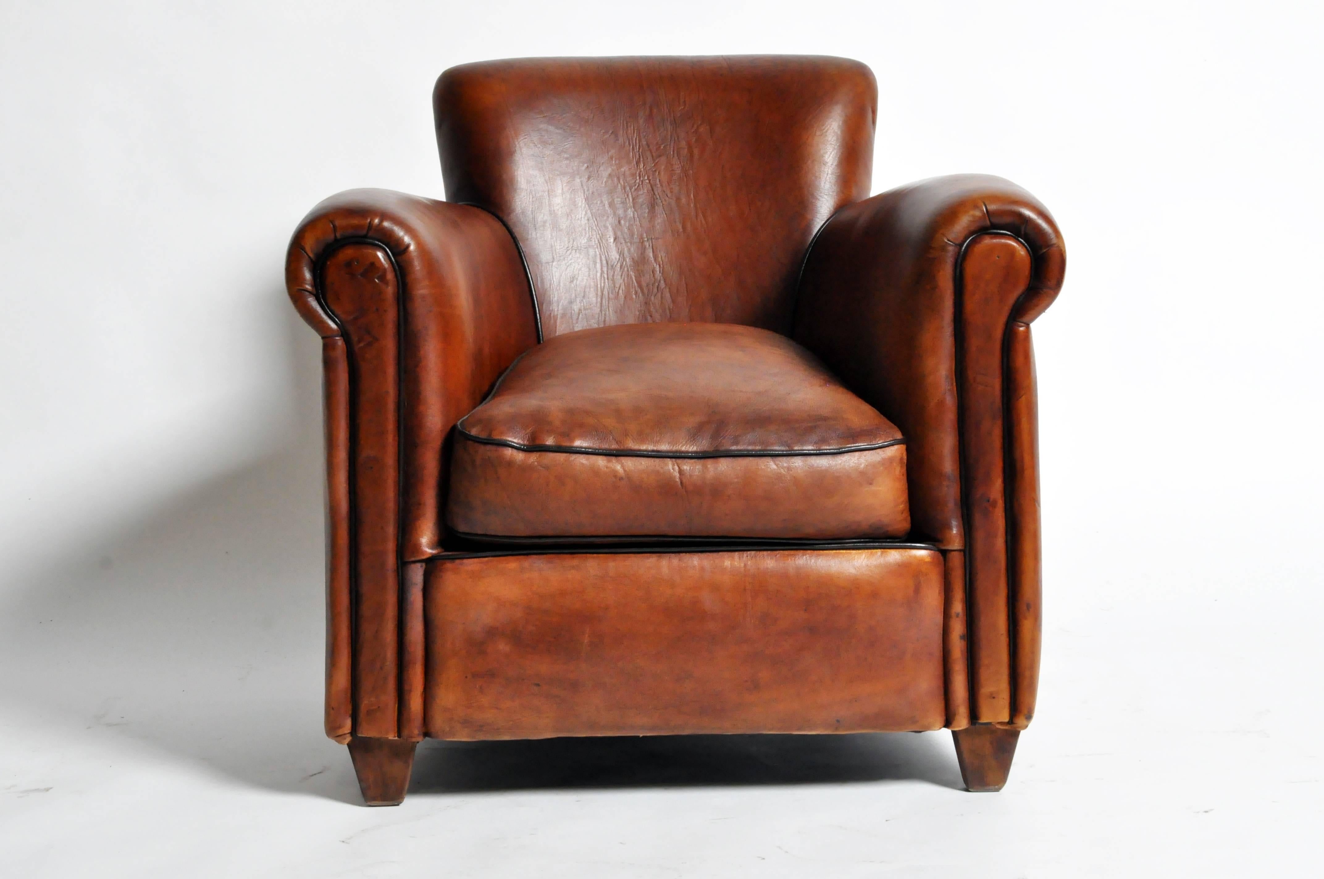 This handsome pair of newly made Parisian dark brown club chairs are from Paris, France and was made from lamb leather. They feature dark brown piping and are highly comfortable.

Additional Dimensions: 17.5