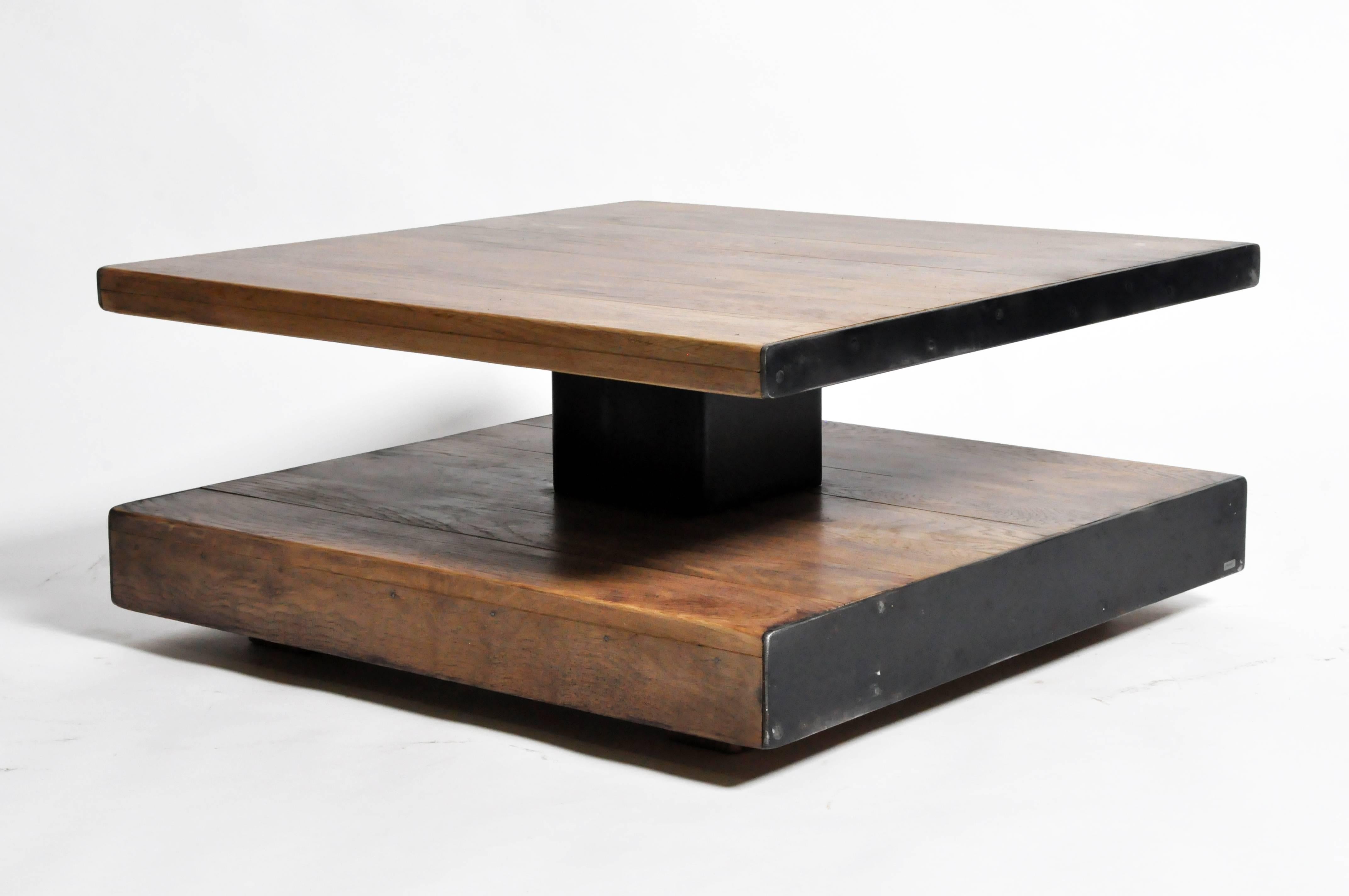 This recently made square coffee table is from Paris, France and was made from oak wood and iron, c. 2017