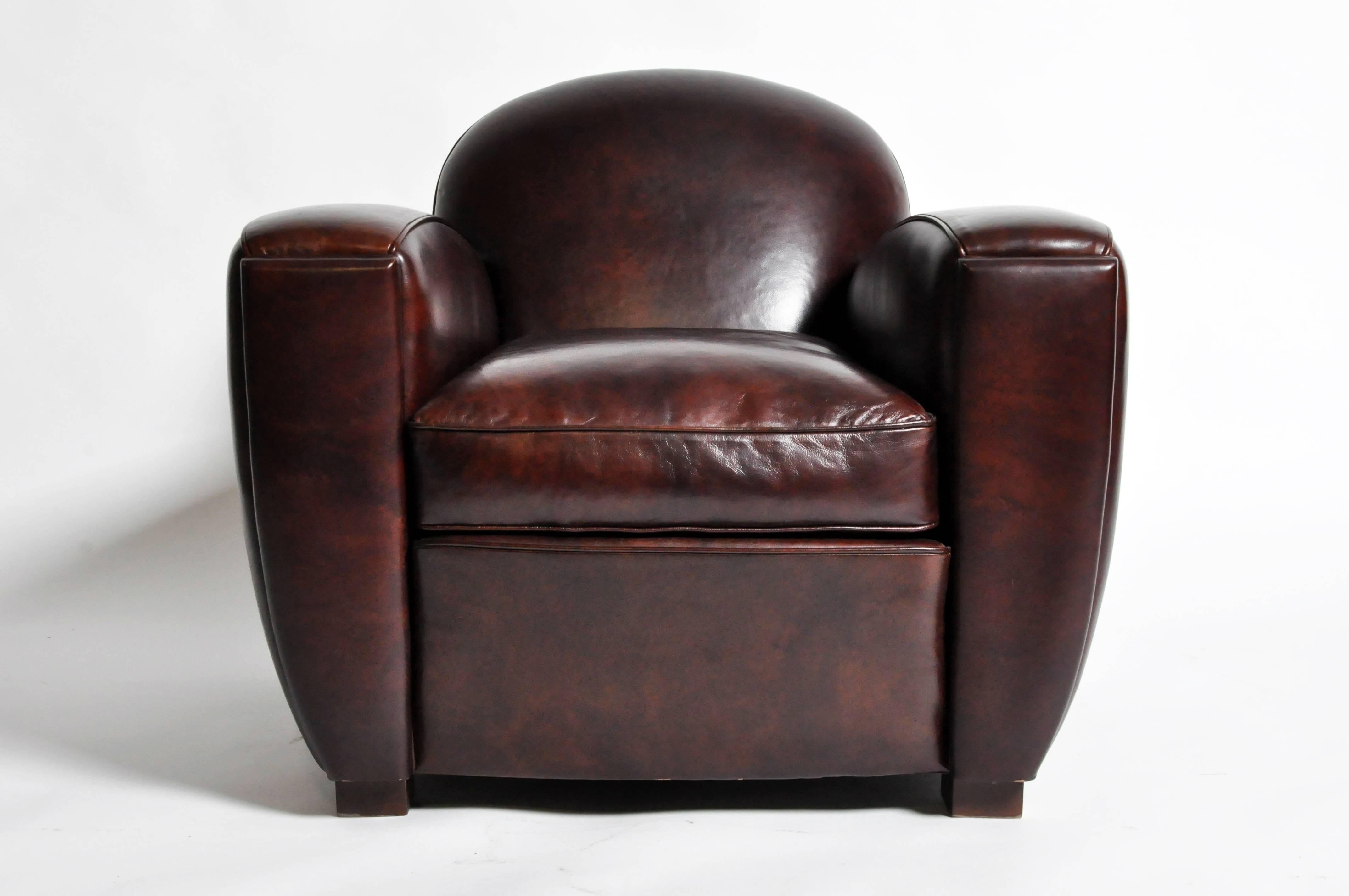 This handsome pair of newly made Parisian low-back maroon club chairs are from Paris, France and was made from lamb leather. 

Additional Dimensions: 21.5