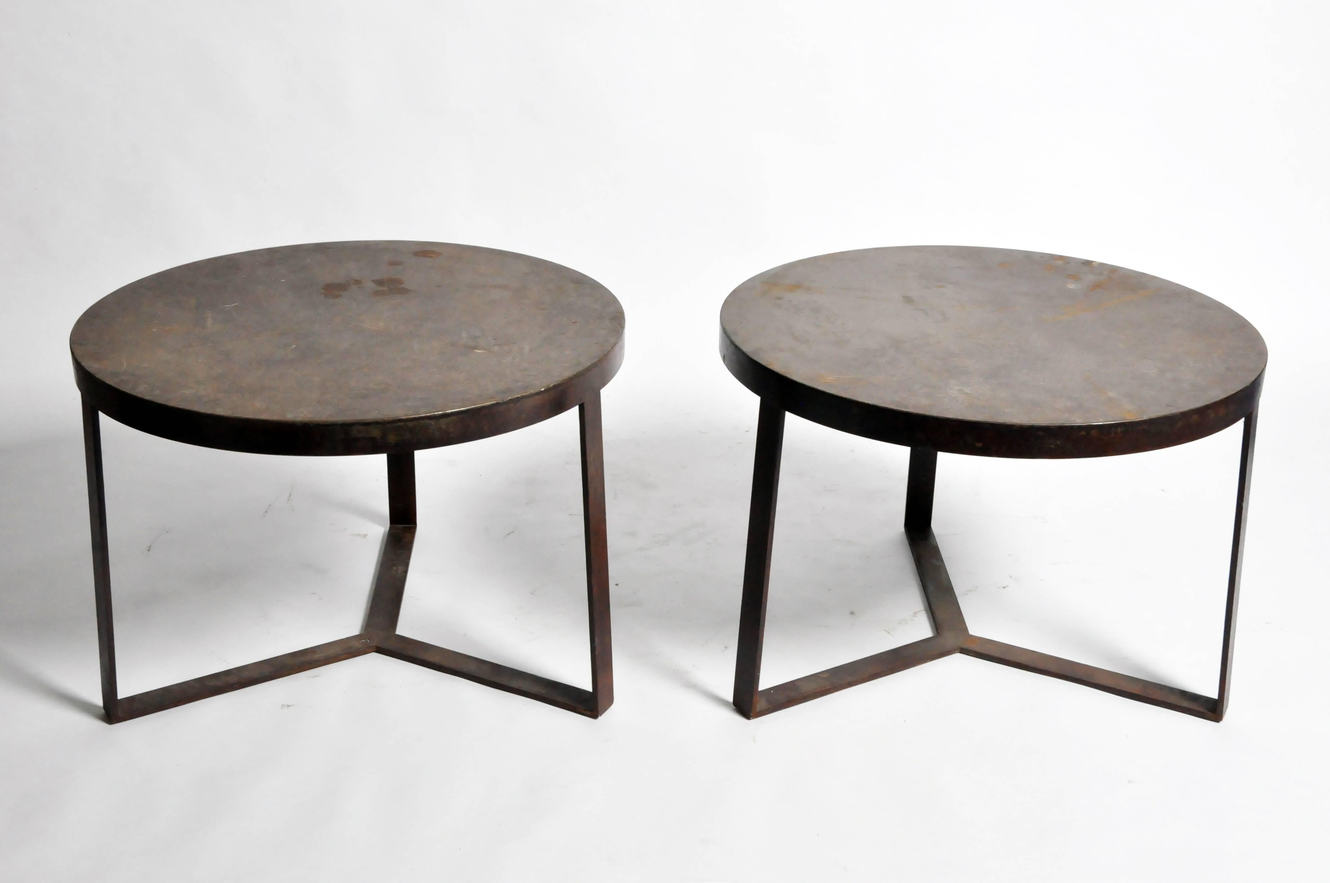 These round side tables are from Italy and was made from iron, c. 1940. They are ideal to add a industrial flare to any space in your home. 