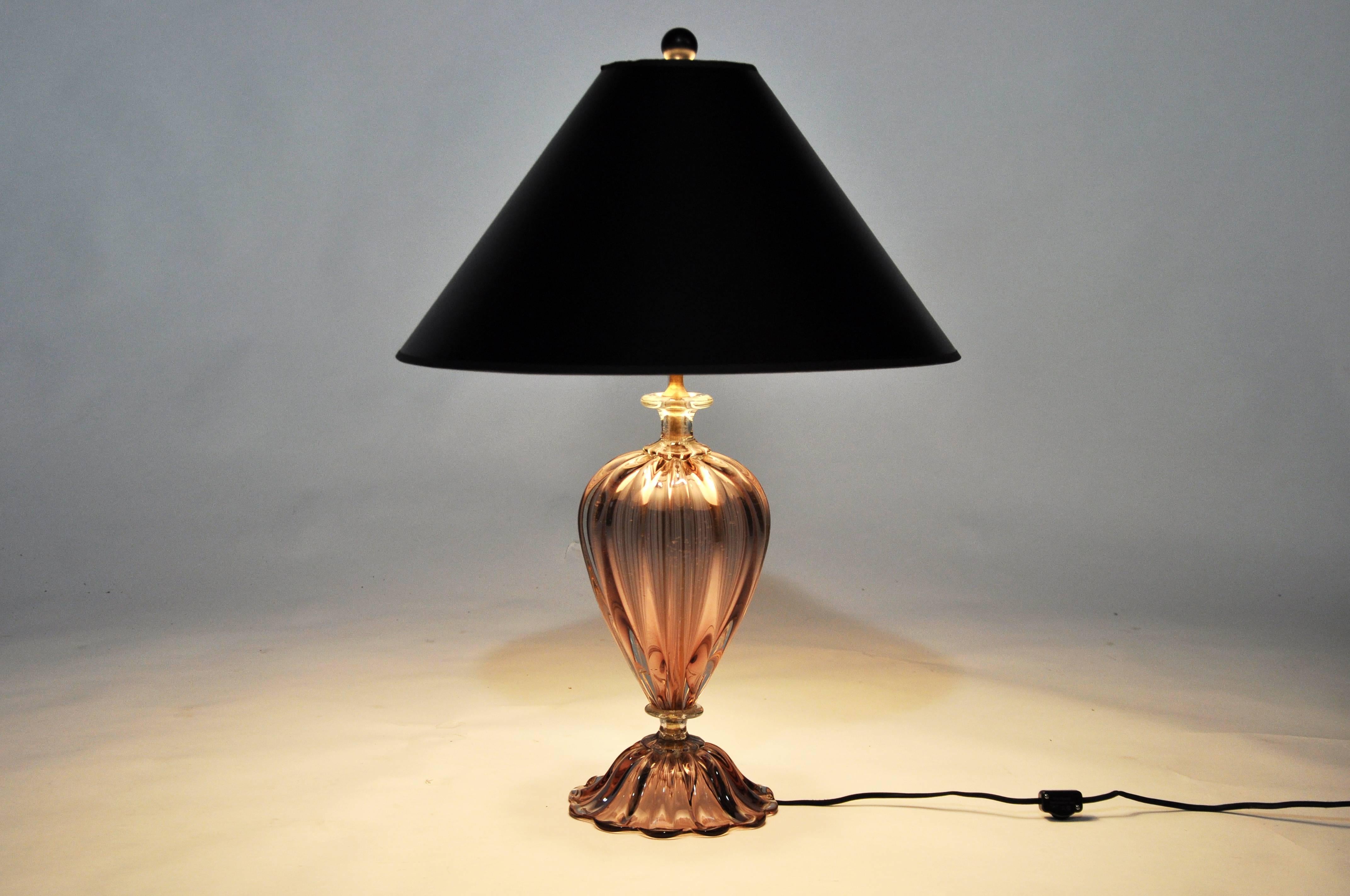 This elegant pair of Murano glass lamps by Bravier & Toso are from Italy, circa 1960. Barovier & Toso is an Italian company that specializes in Venetian glass. The company is one of the oldest family businesses in the world, founded in 1295 as
