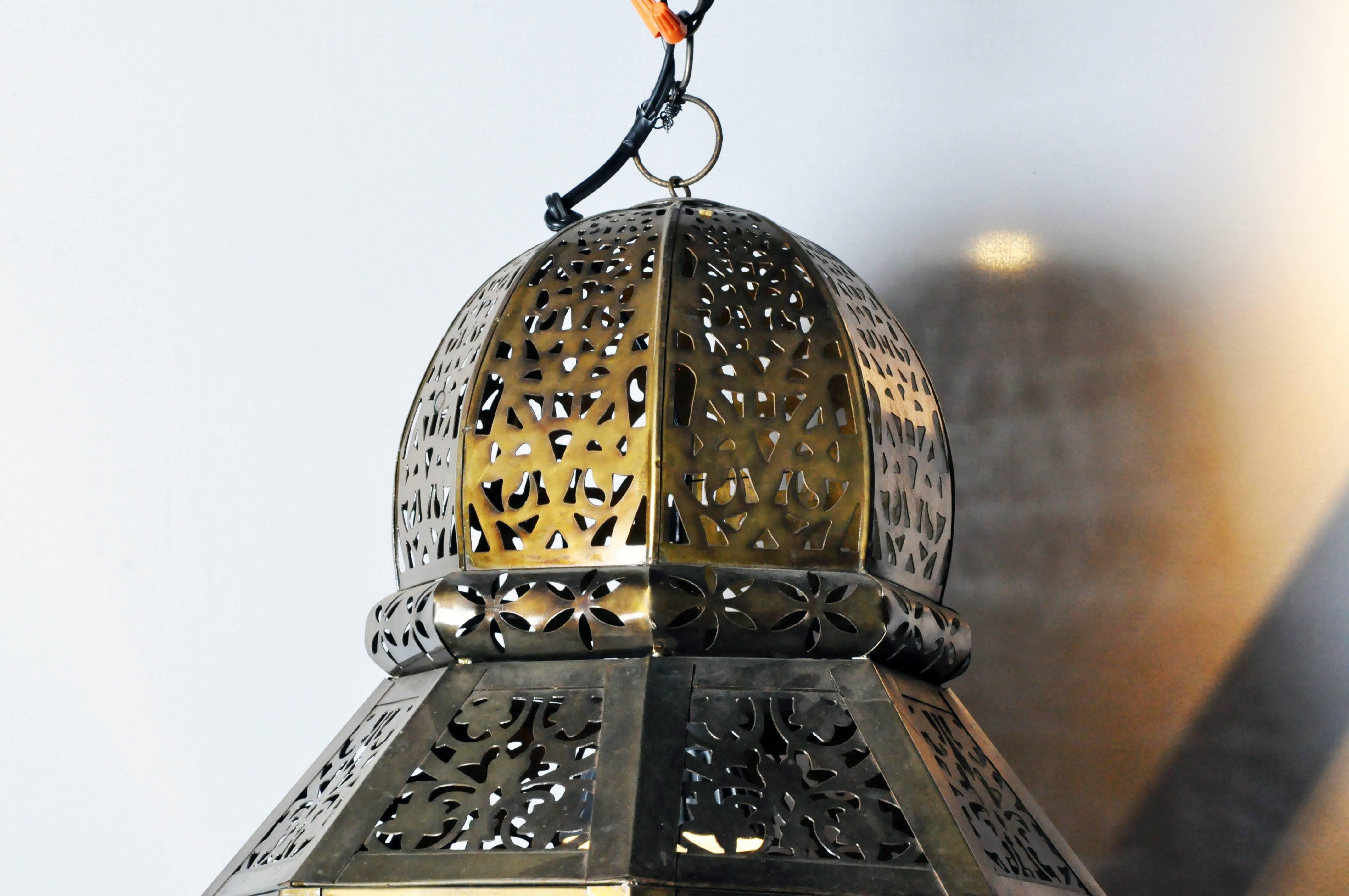 Though newly handcrafted in India, this intricately carved metal lantern channels an old-world feel. When lit it dances to life—adding an exotic flare to any space.