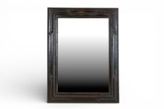 Cadre de miroir ébénisé du nord de l'Italie, de style flamand