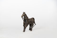 Una statuetta in ottone raffigurante un cavallo Una statuetta in ottone raffigurante un cavallo Una statuetta in ottone raffigurante un cavallo