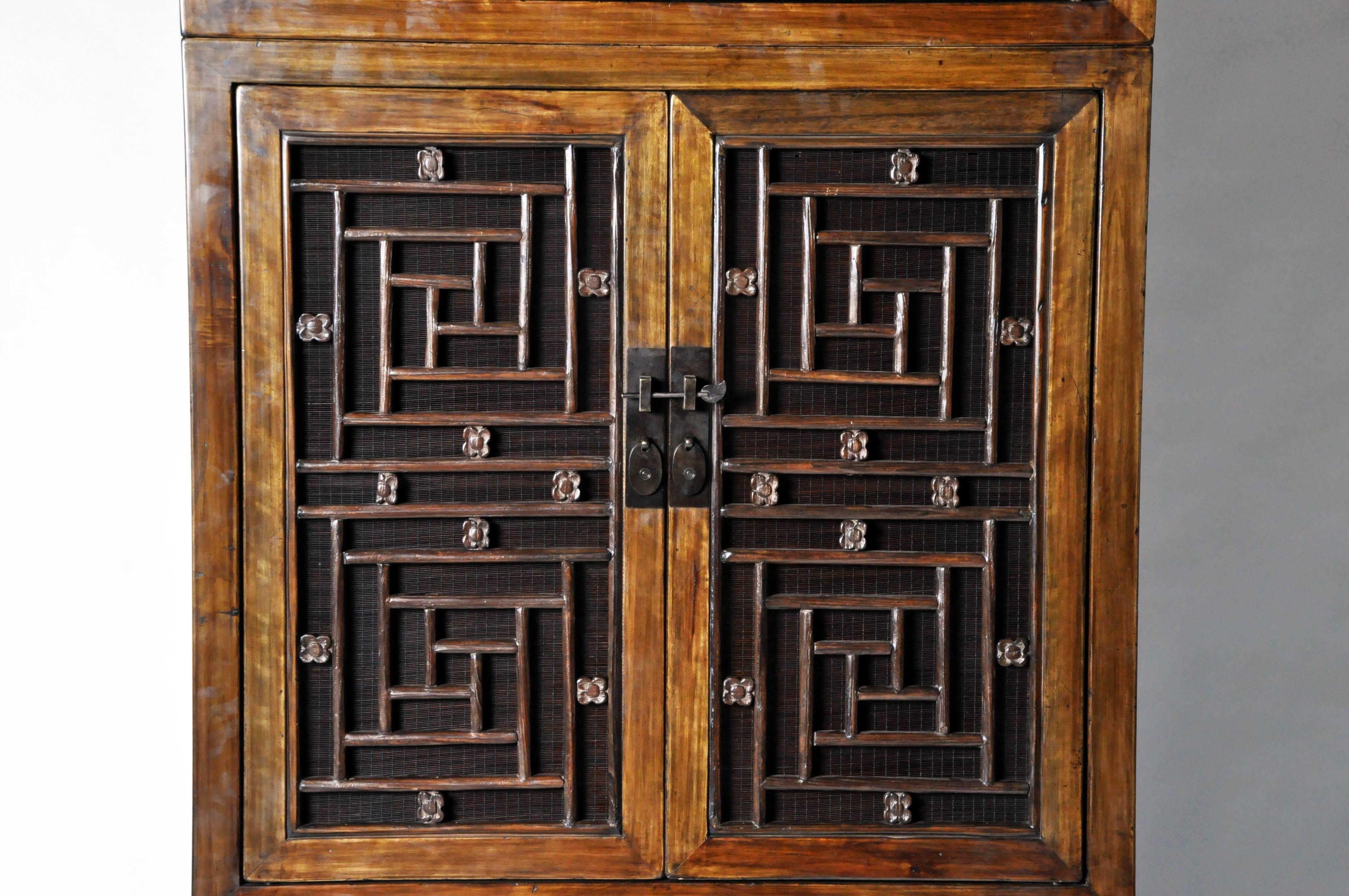 Tall Chinese Lattice Door Cabinet with Restoration In Excellent Condition In Chicago, IL