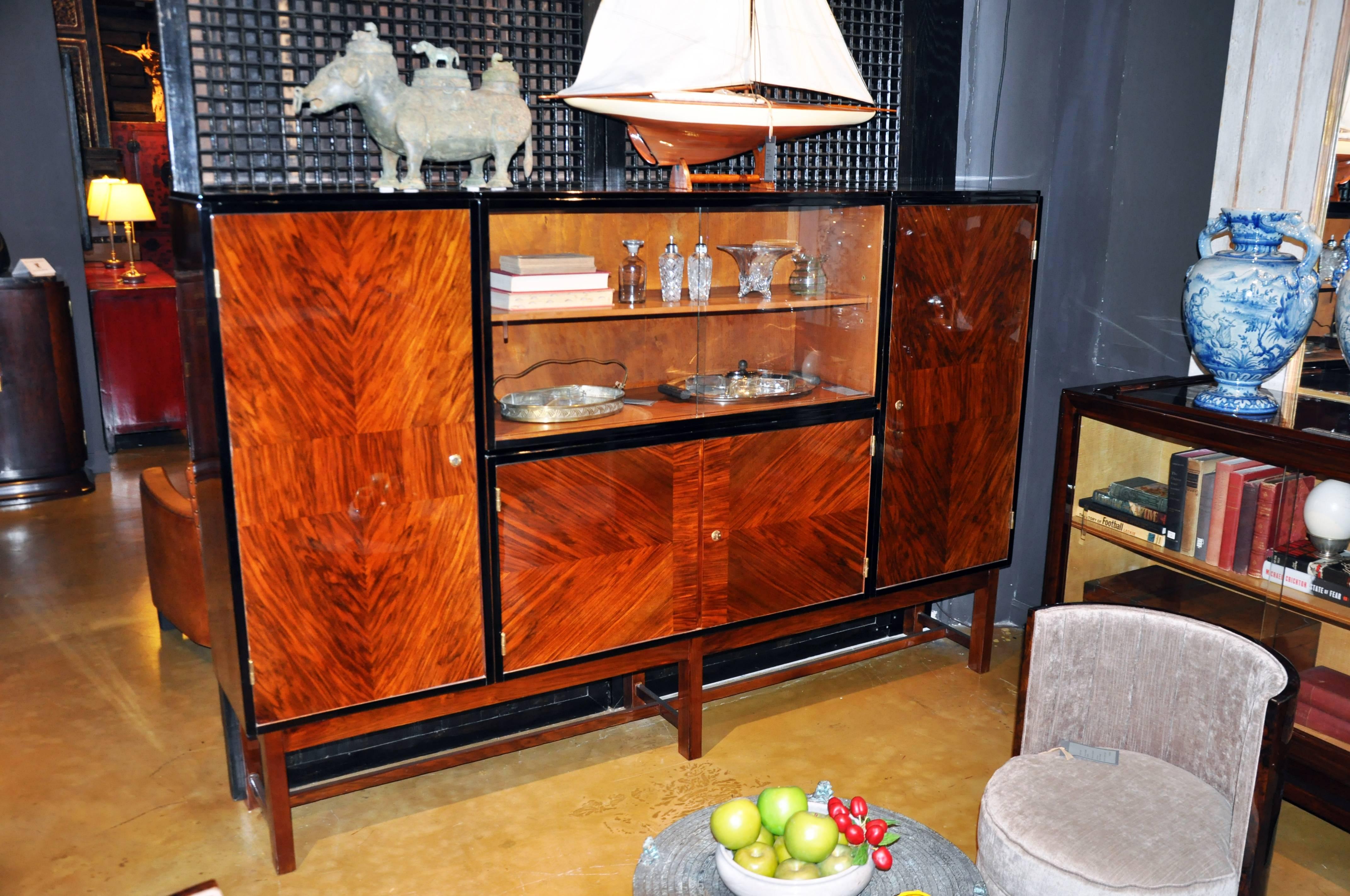 This elegant Art Deco sideboard by Karoly Lingel is from Hungary and is made from walnut veneer.