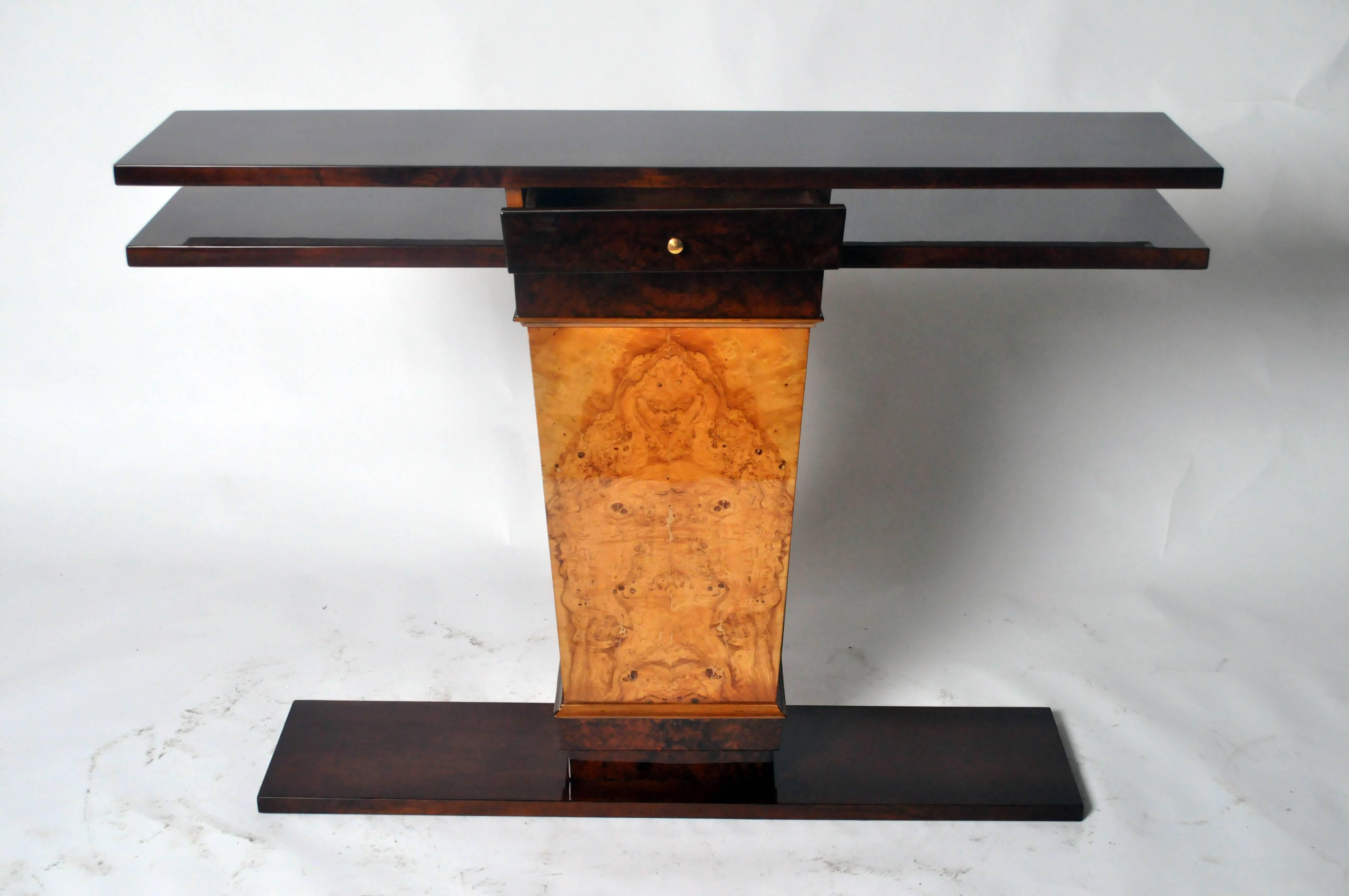 This Art Deco style pedestal console table is from Budapest and is made from walnut veneer.