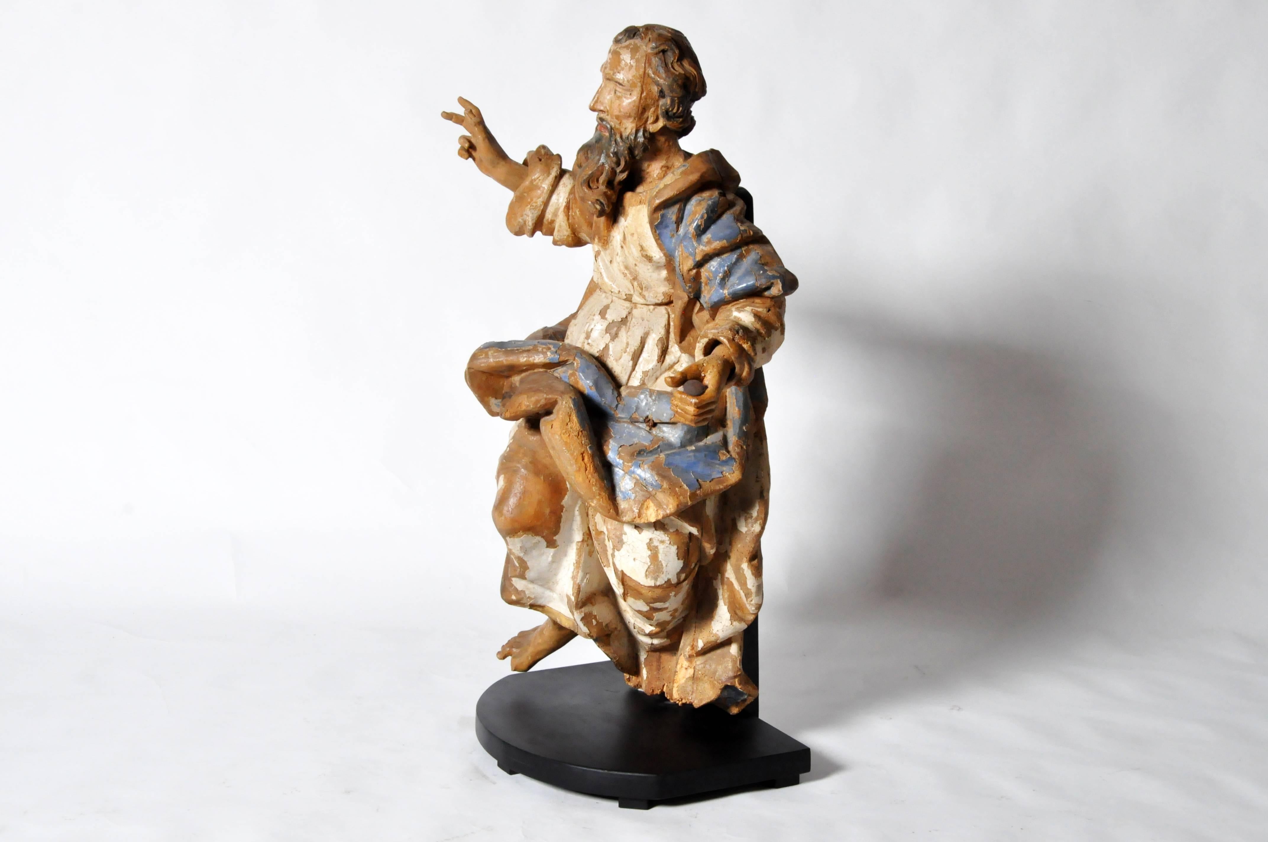 This sculpture of Saint Peter is from Italy and is made from poplar wood, circa 16th century. Saint Peter, according to the New Testament, was one of the 12 Apostles of Jesus Christ, leaders of the early Christian Church. He is also the 