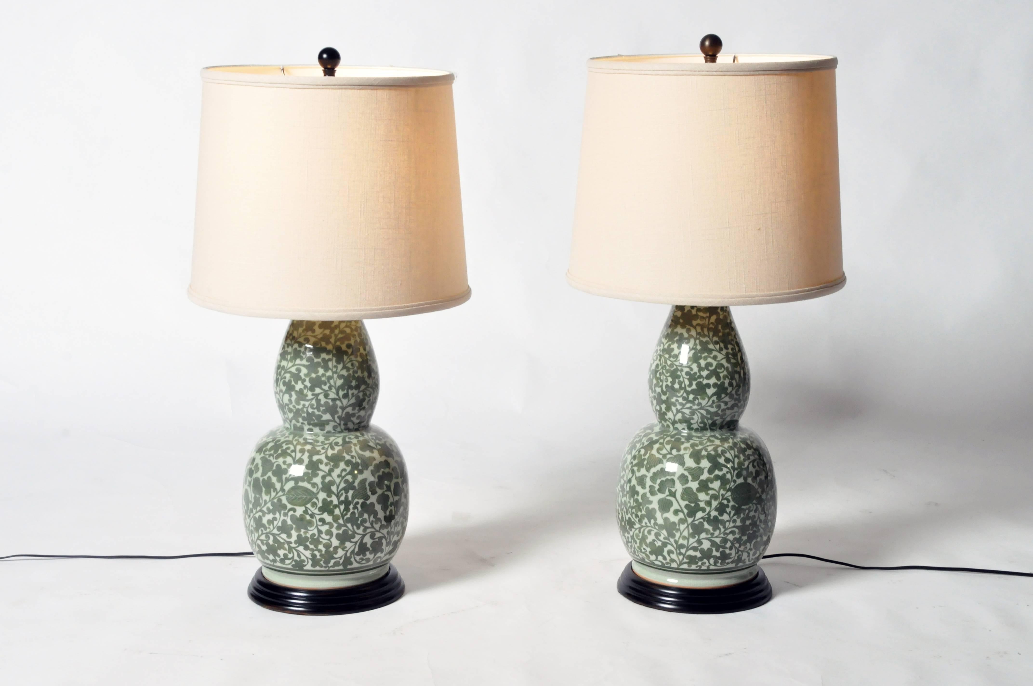 These beautiful floral motif double gourd form vase are from Thailand and were converted to table lamps.