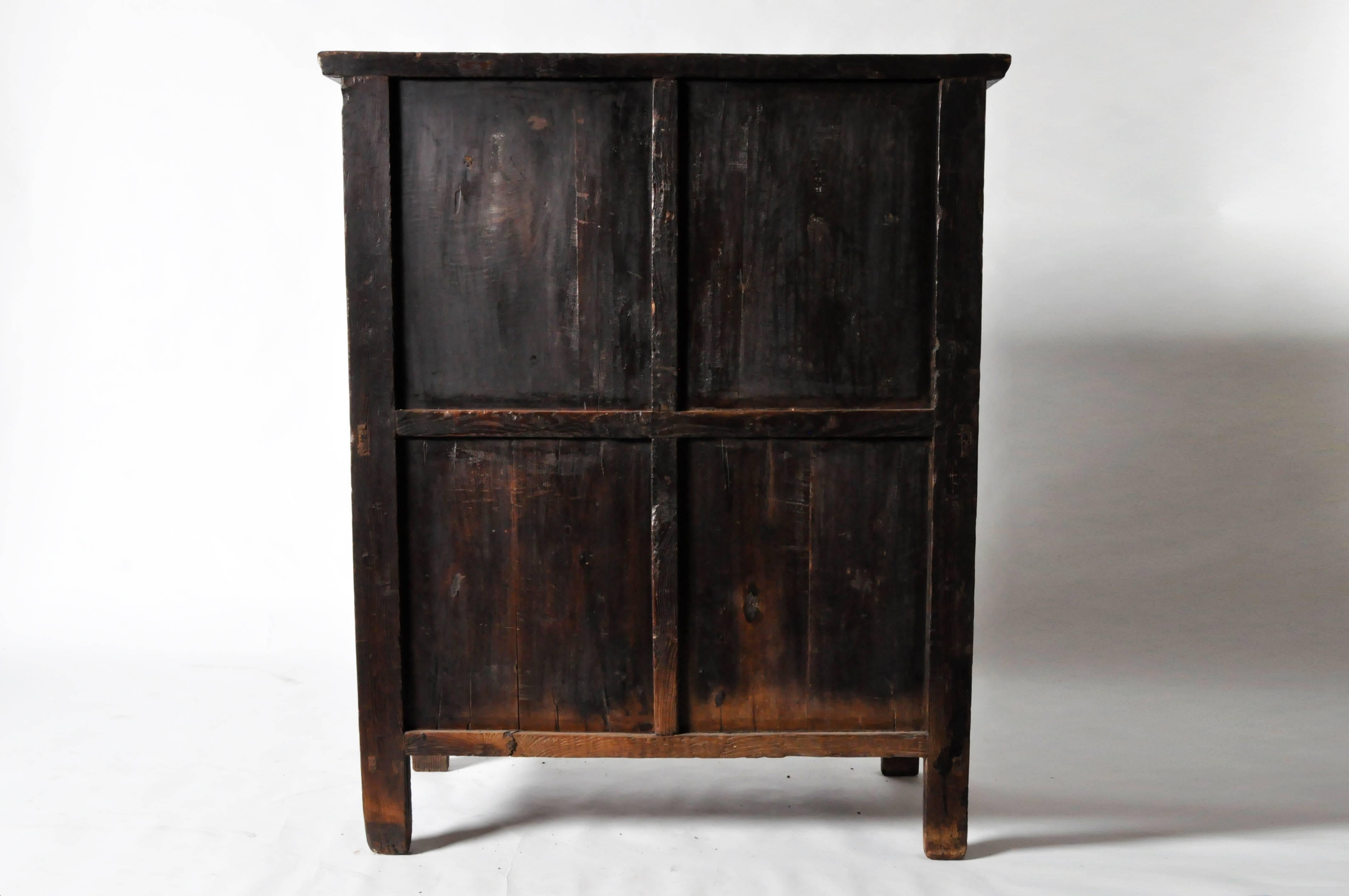 Chinese Oxblood Lacquer Cabinet with Bi-Fold Doors In Good Condition In Chicago, IL