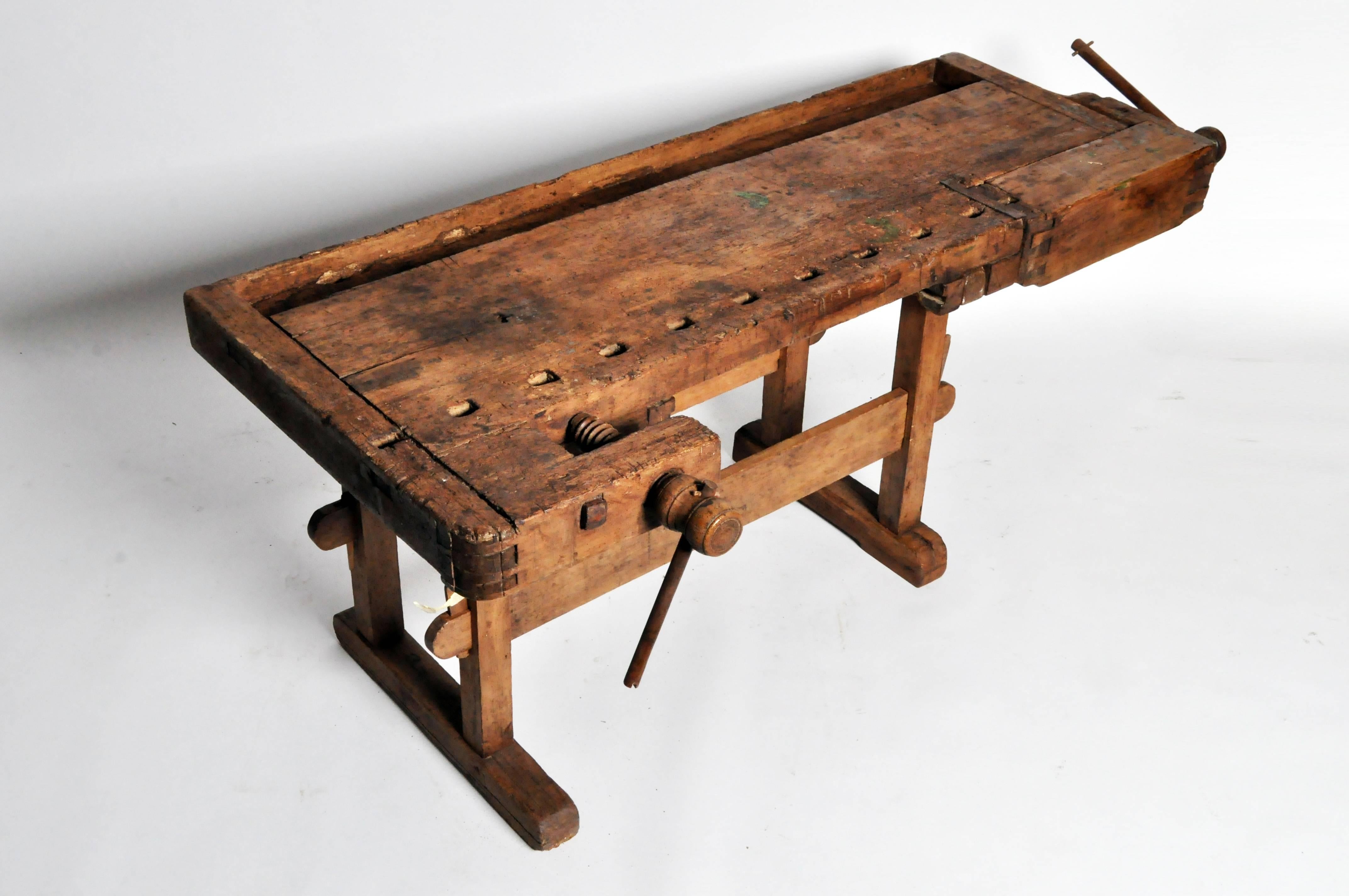 This handsome work bench is from Italy and is made from oak and pinewood, circa 1900. Features a beautiful aged patina.