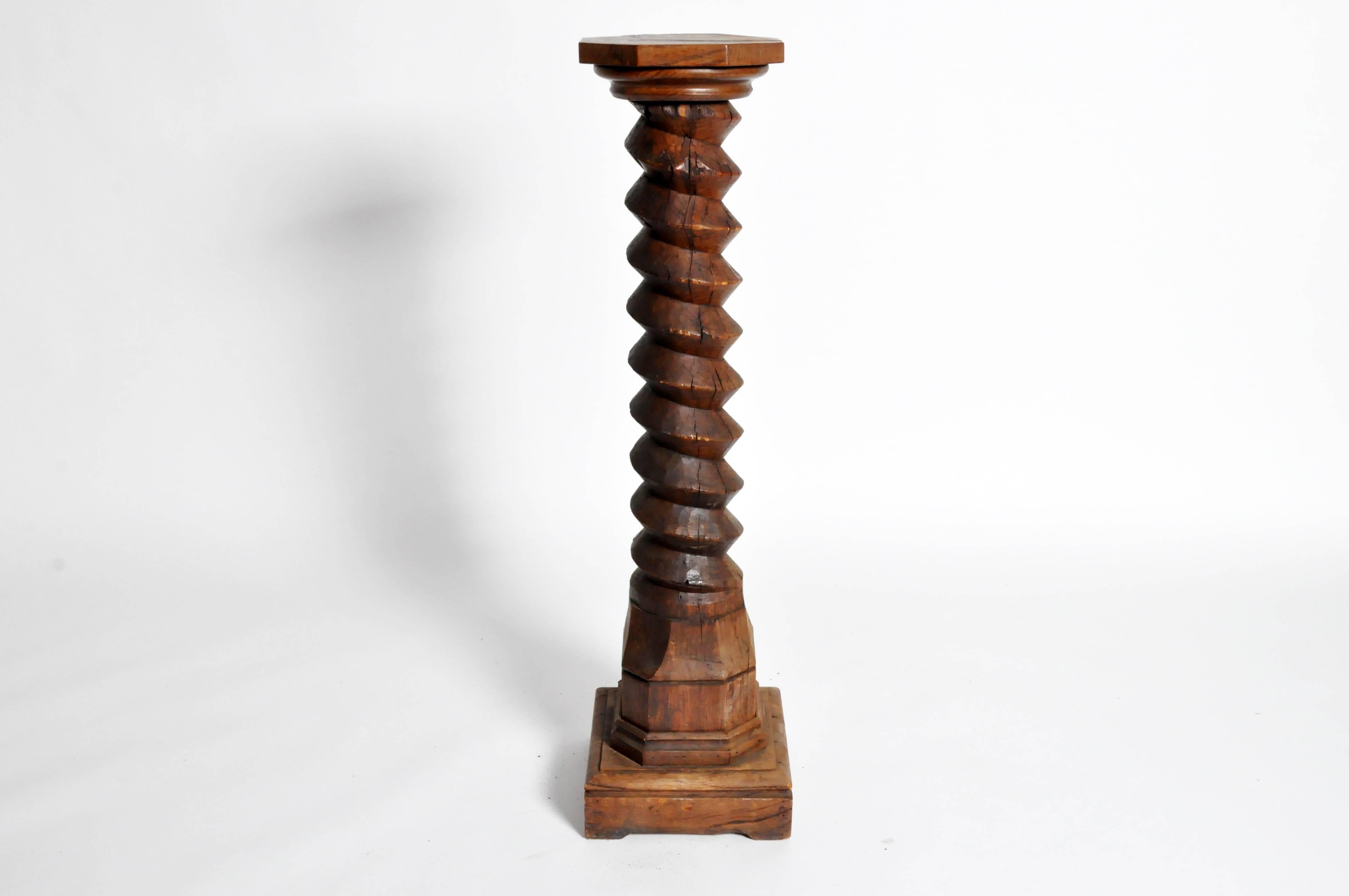 This wine press screw is from France and is made from walnut wood, circa 1870. The piece can be used as a pedestal as well for display.