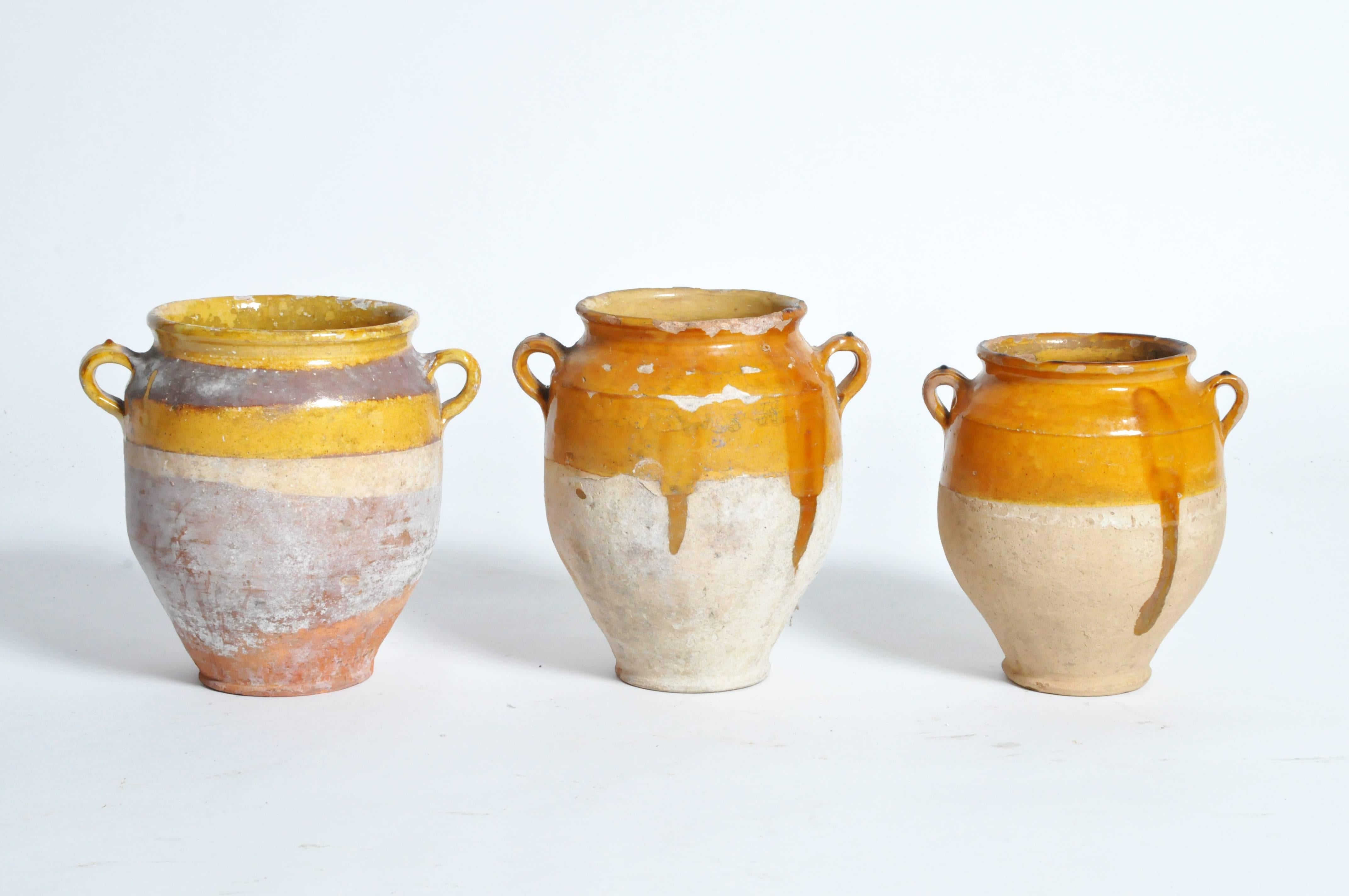 These ceramic glazed confit jars are from Provence, France, circa 1890. Sizes may vary slightly.