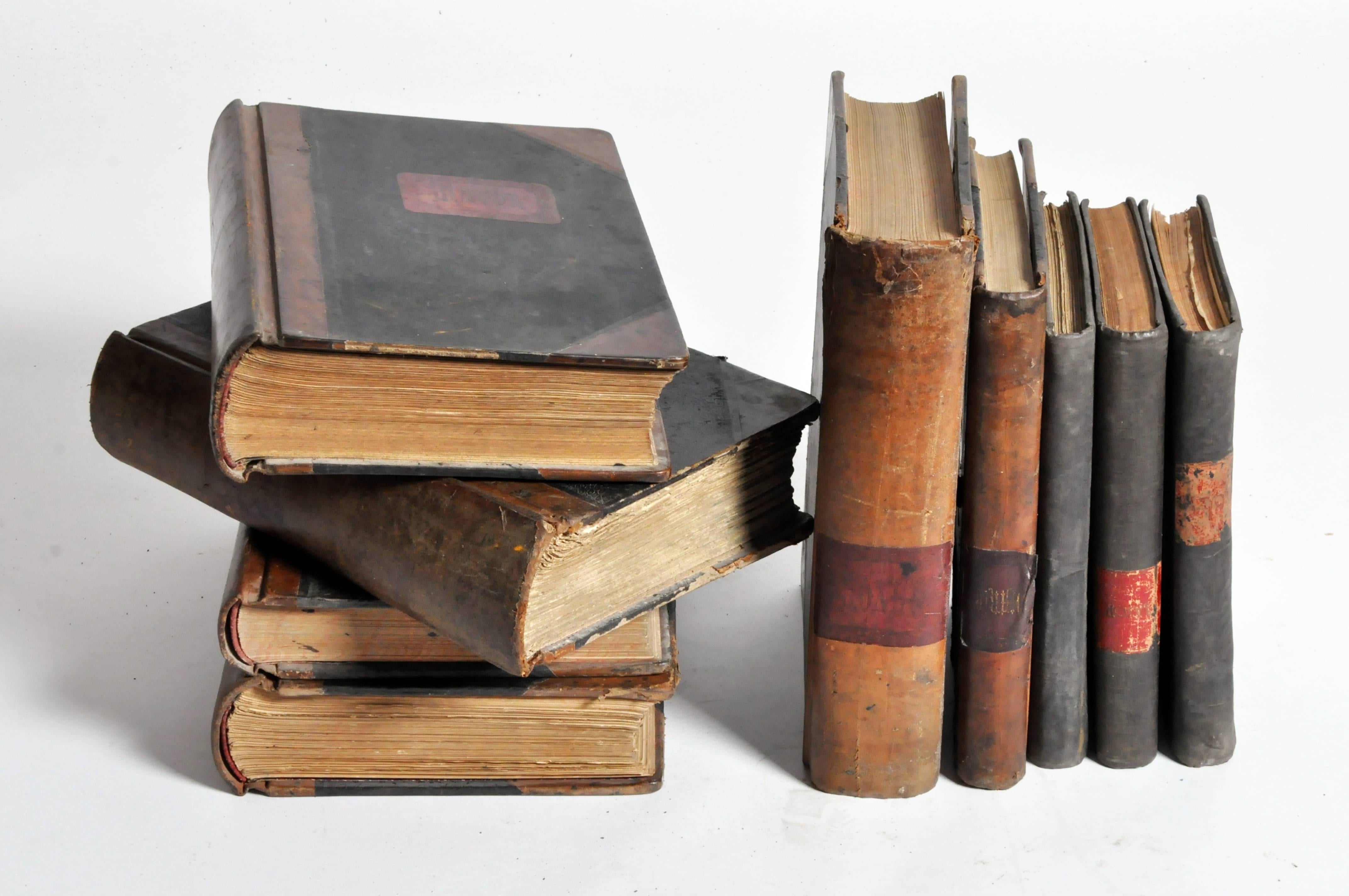 Fit for Don Quixote himself, this handsome set of Spanish, leather bound books would make a fine addition to an office space or library space.