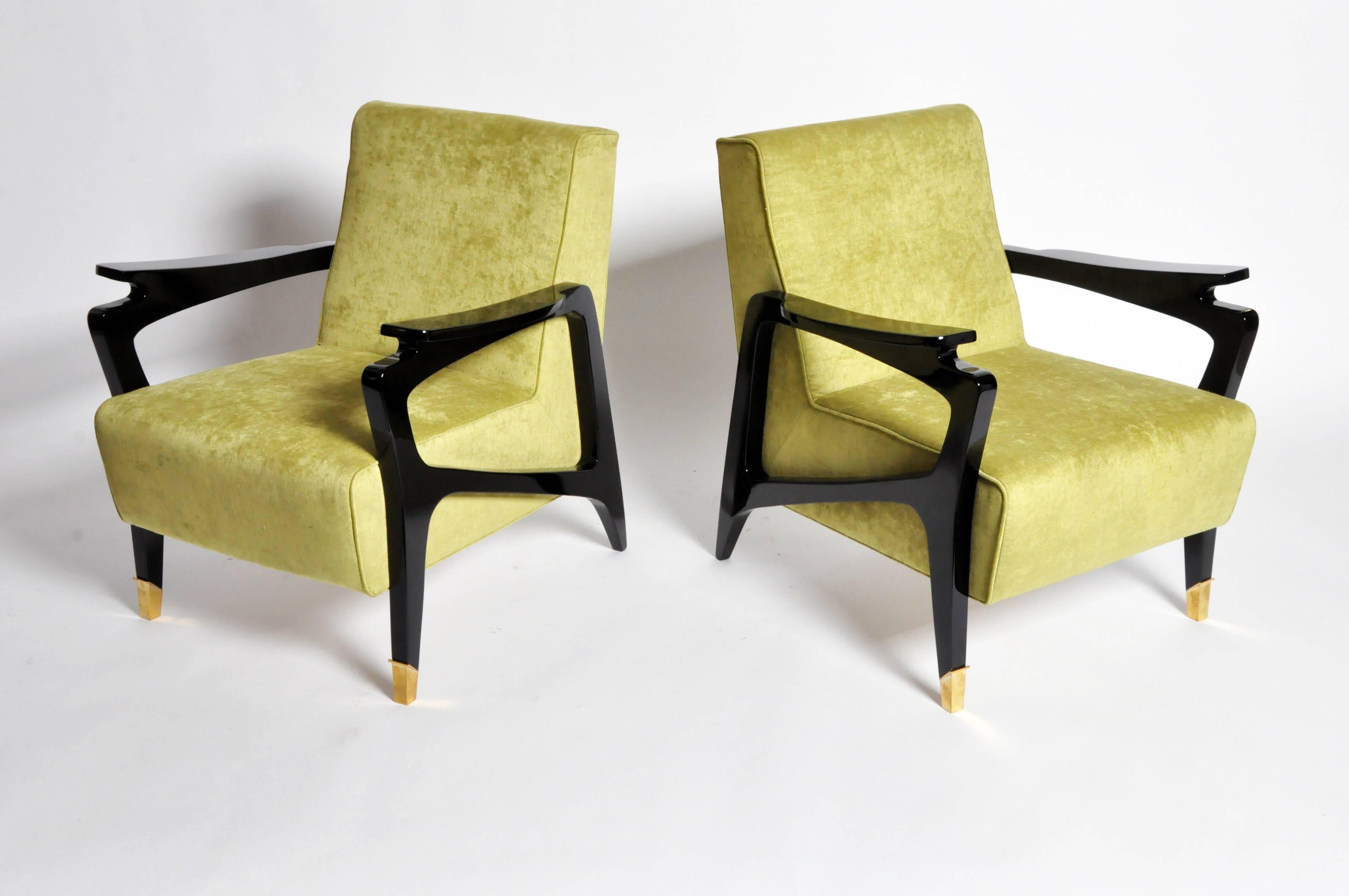 Impressive Pair of Raphael-Style Chairs.  A beautiful combination of sleek, sculptural elements and bold, modernist design are what make these pieces sing.  Arms are finished in a pristinely polished, black walnut veneer.  Ample pillows upholstered