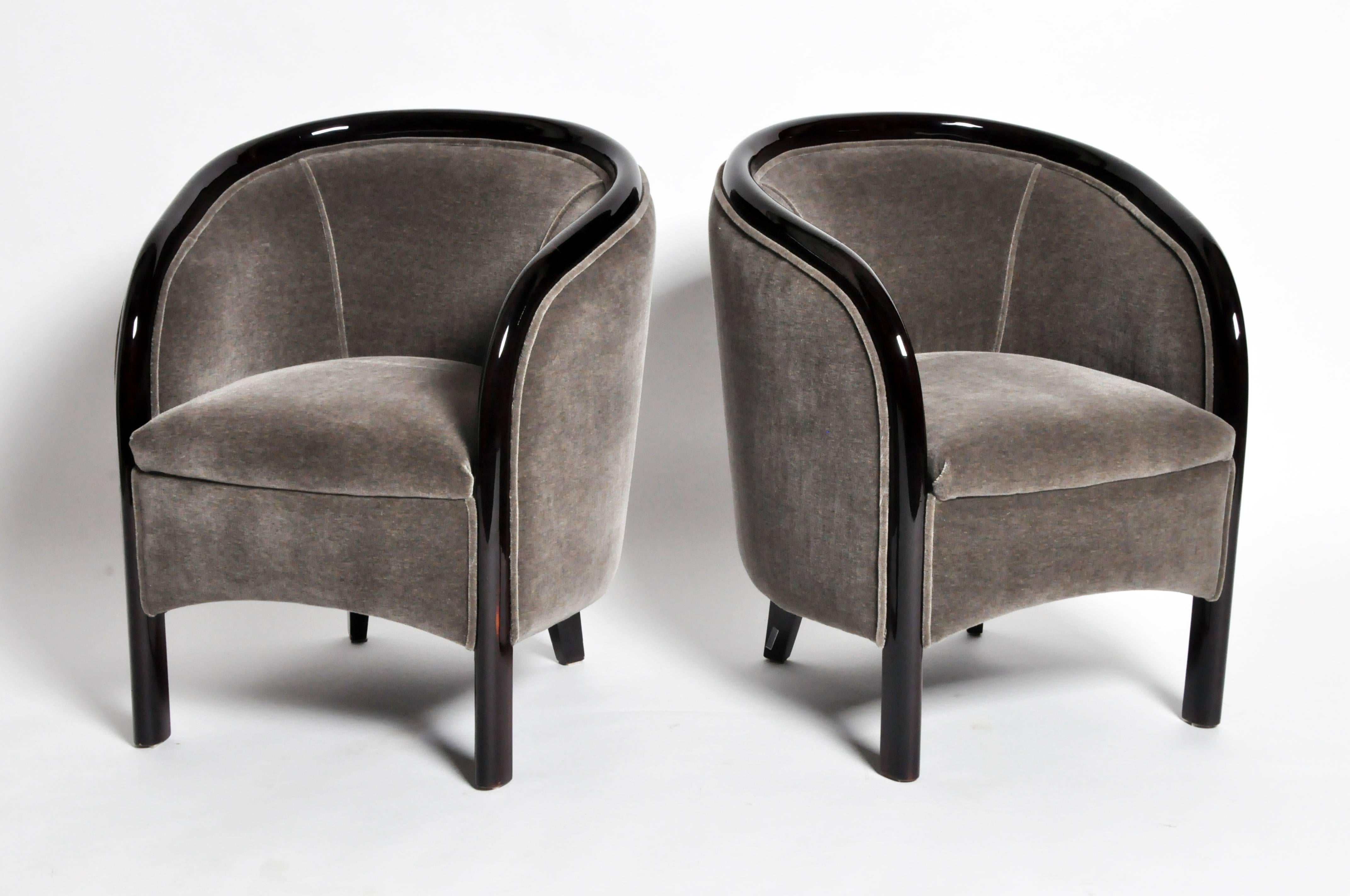 This pair of elegant club chairs are from Hungary and made from solid beechwood, circa 1960.