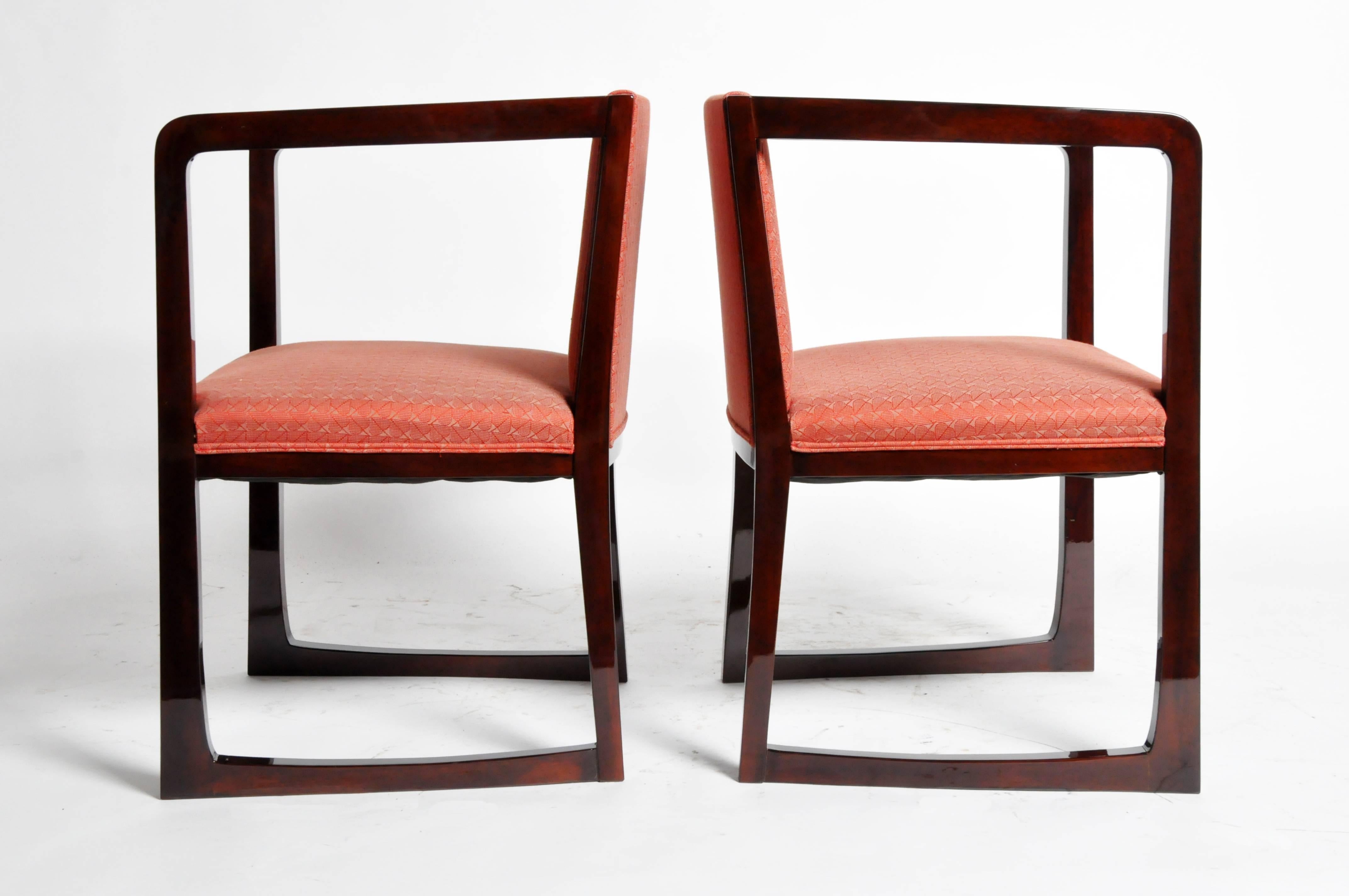 This pair of Art Deco style armchairs are from Budapest, Hungary and are made from walnut, circa 1960.