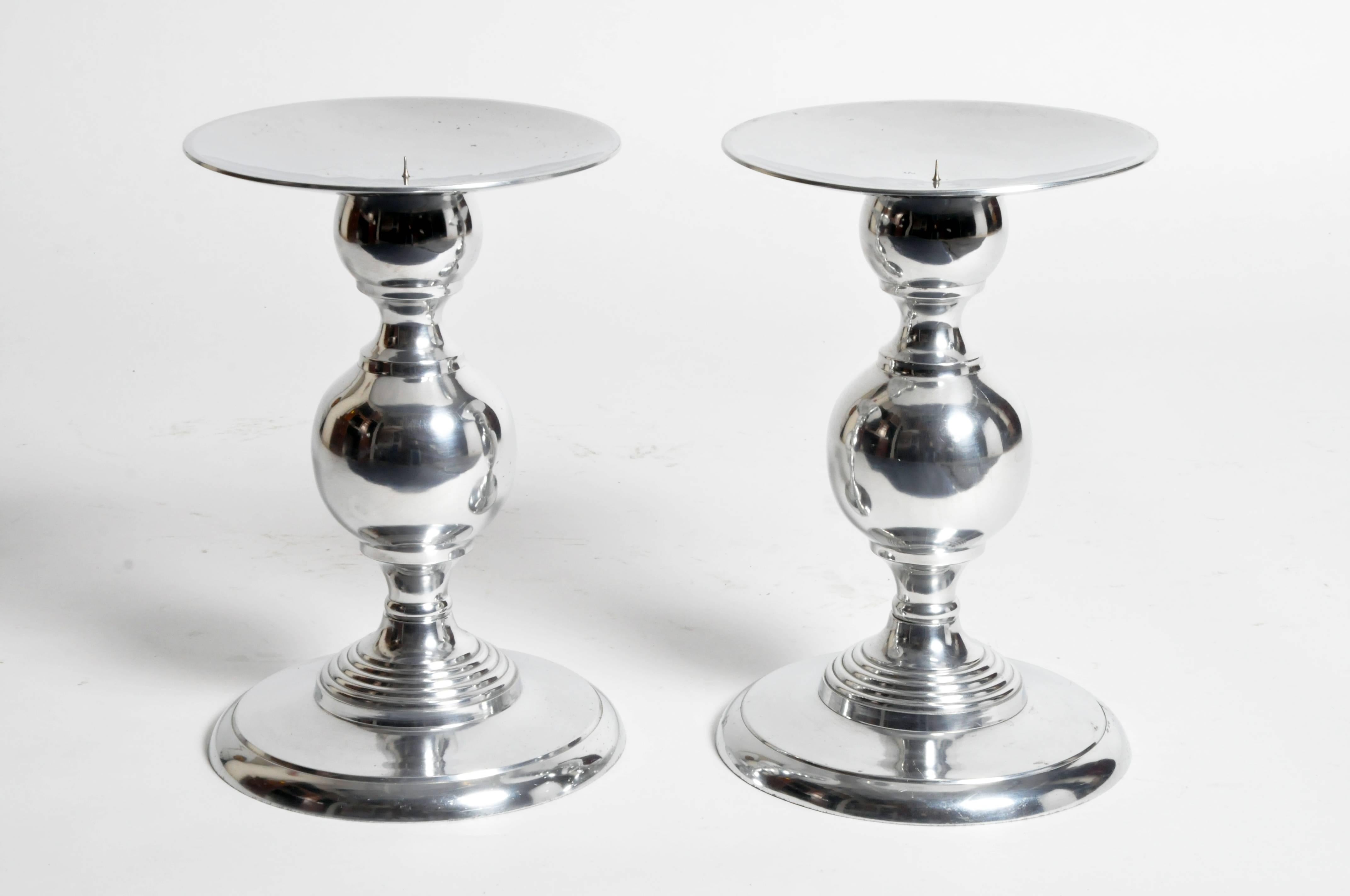 This elegant pair of candleholders are from Paris, France and they are newly made.
