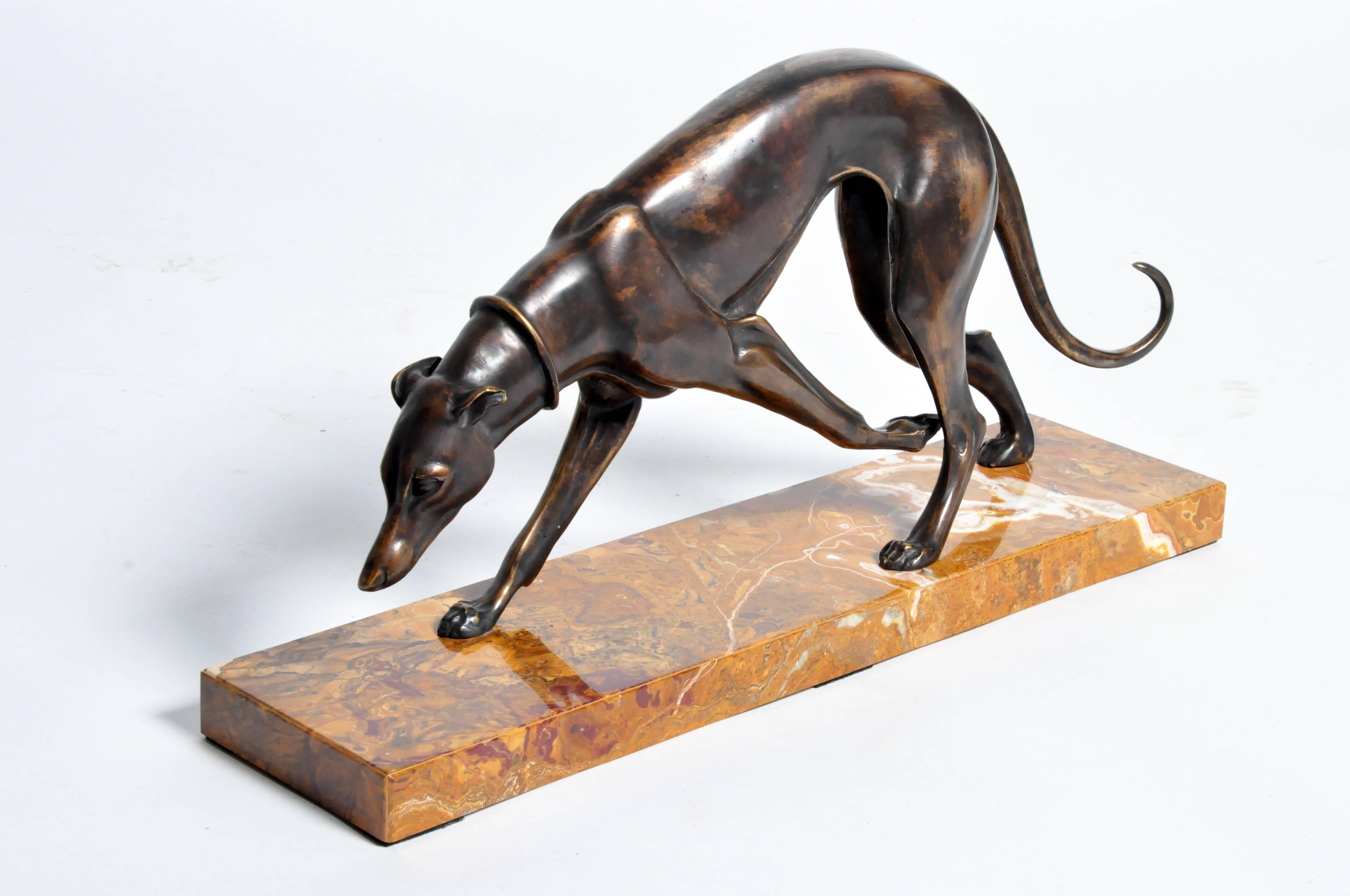 This elegant Art Deco greyhound sculpture is from Paris, France, circa 1930 and was done by Irénée René Rochard
        