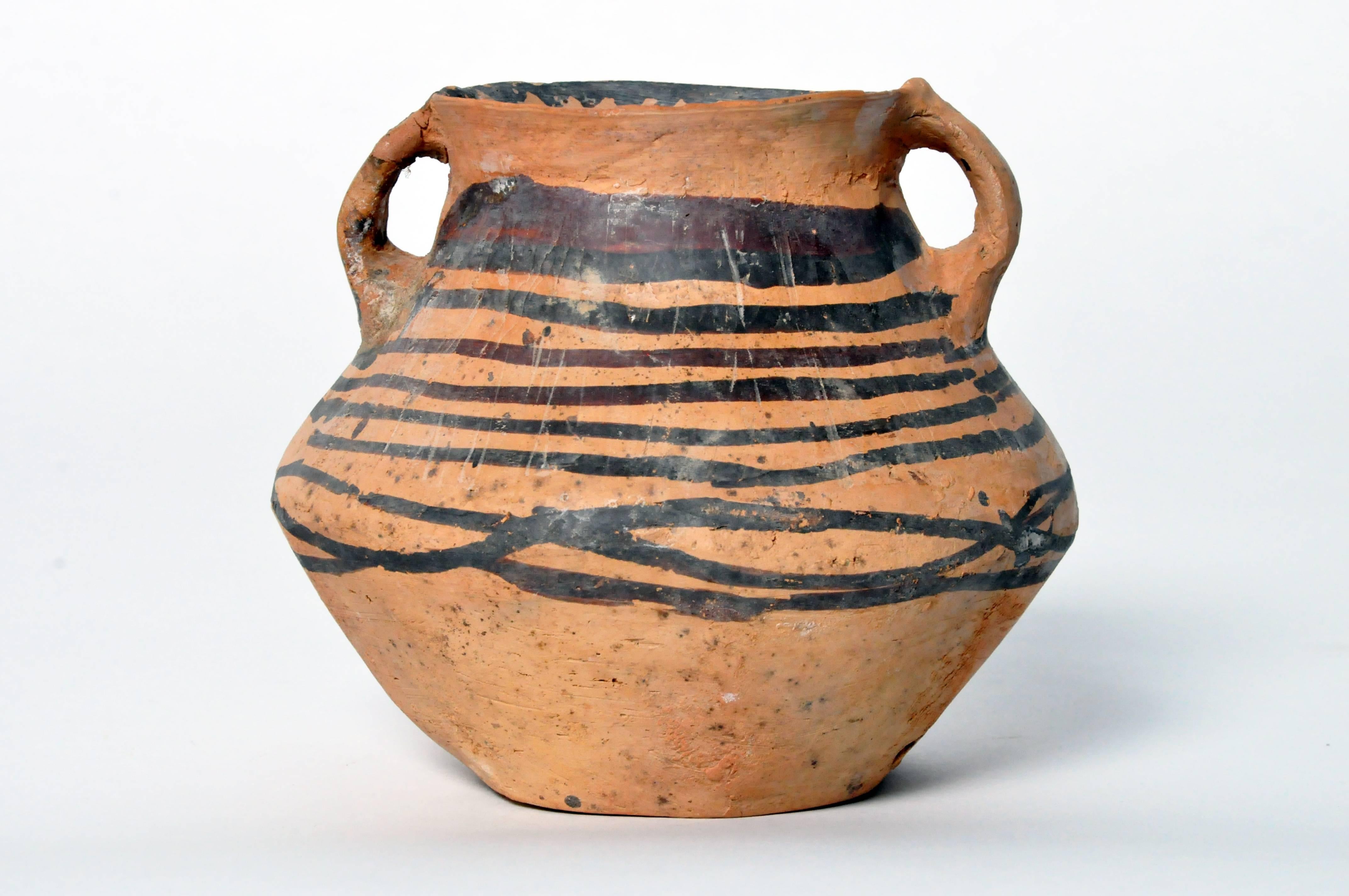 This jar was made in the Yangshao culture and is of the Machiayao type. This culture thrived in the northwestern part of China along and around the Yellow River between 3000 BC and 1700 BC The piece is in very good condition with no cracks to the