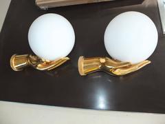 Pair of Arlus Gilt Brass Hands with Opaline Globes Sconces
