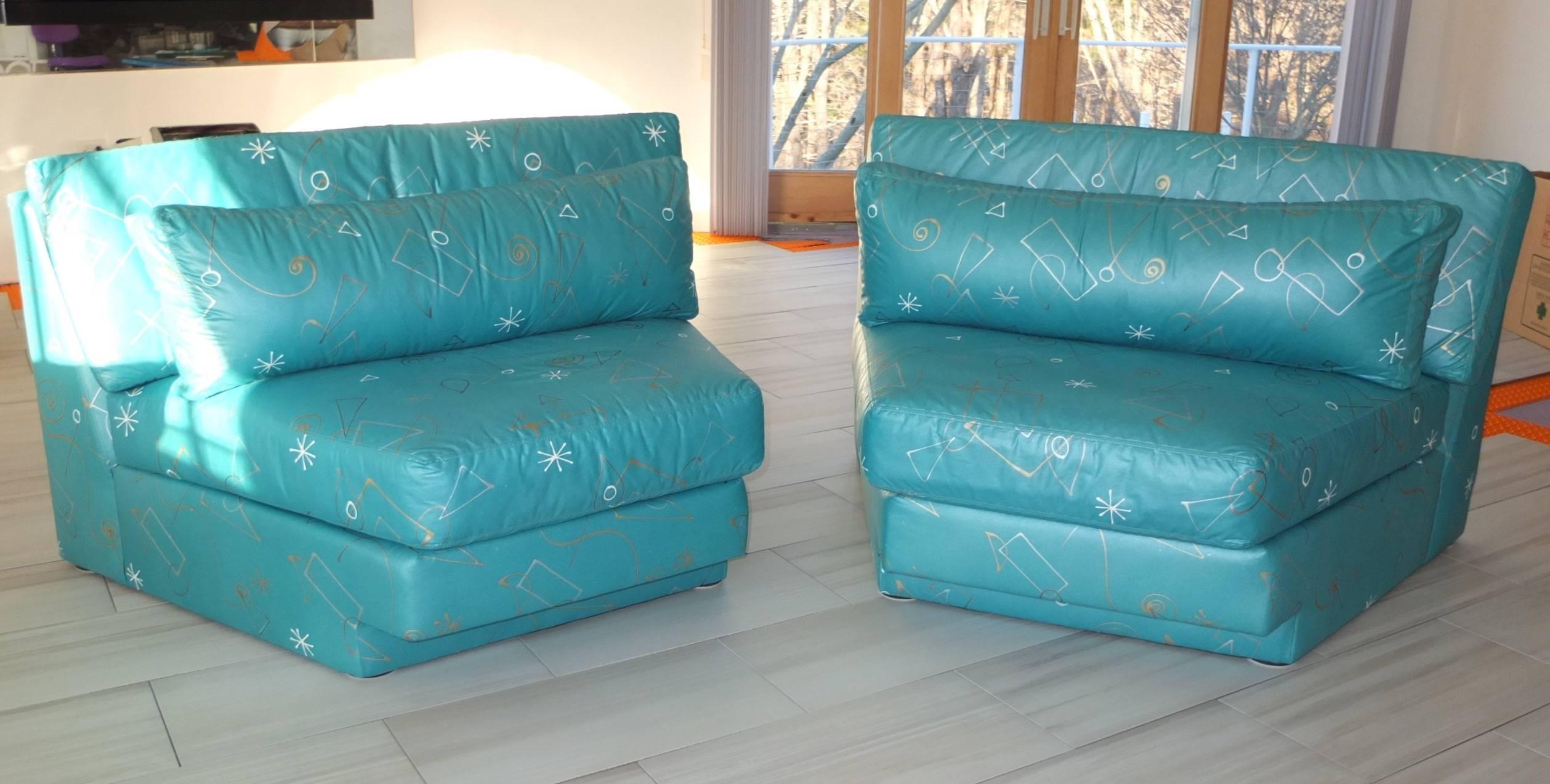New old stock never been used pair of wedge shaped seating sections in the style of Milo Baughman and Vladimir Kagan. Made by Classic Gallery, Highpoint, circa 1995. Totally upholstered in teal chintz with hand-painted graphic designs in silver,