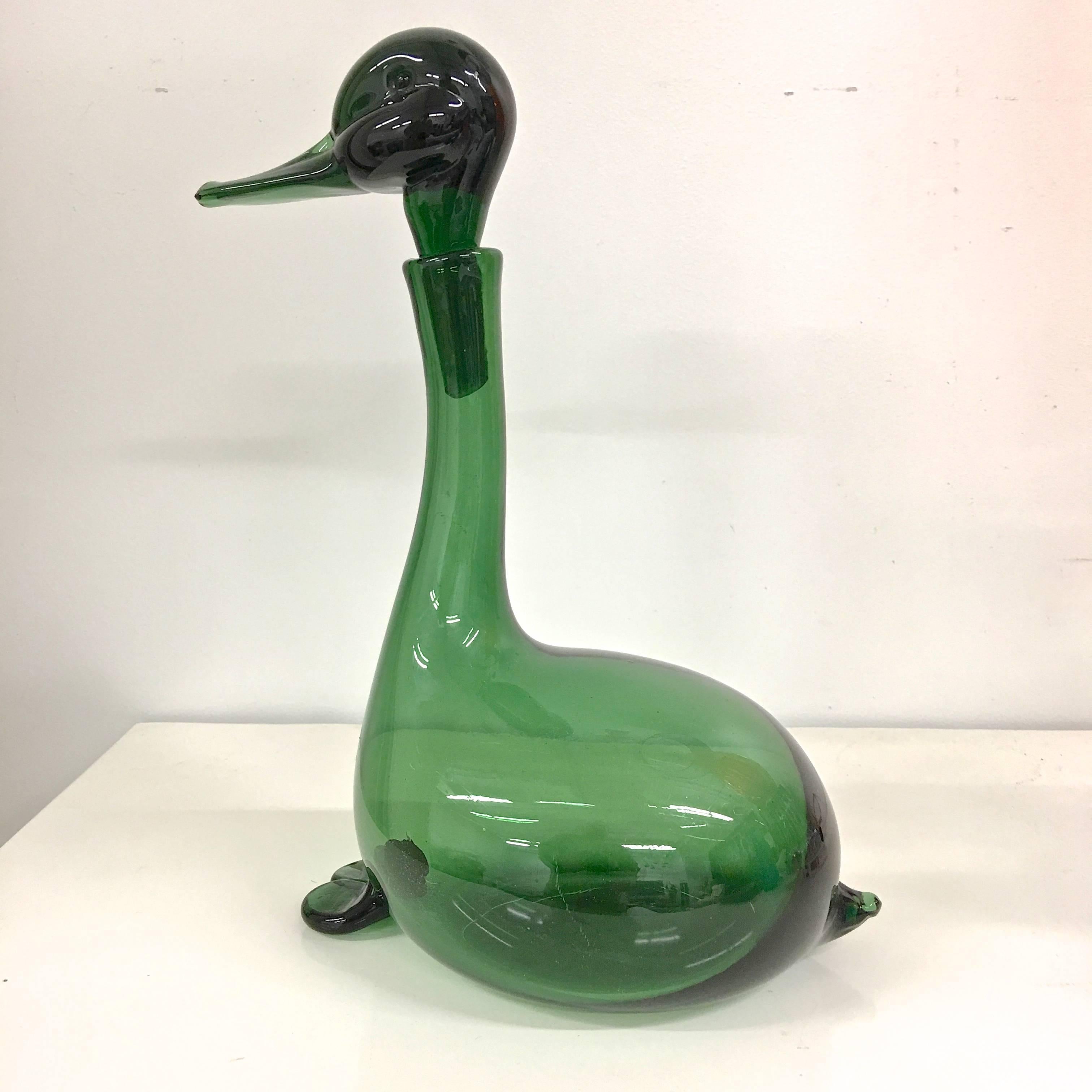 A hand blown Empoli Verde wine decanter in the shape of a duck inspired by the designs of Gio Ponti for Taddei di Empoli in the early 1950's and produced in the 1960's by Toso Bagnoli specifically for the American market.

Gio Ponti promoted the