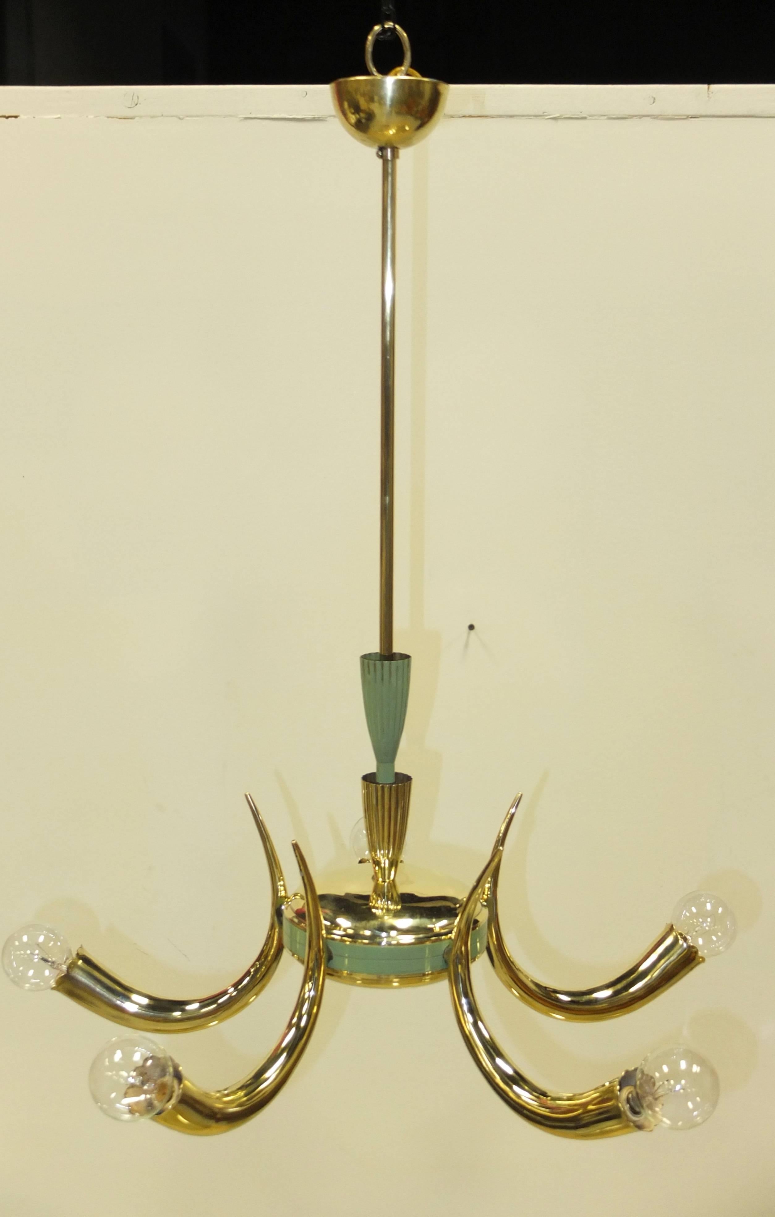 Superbly crafted 'Horn of plenty' sconces with five curved brass horns with slightly scalloped edges around a solid brass cluster body enameled in seafoam green (can be changed or removed to show only brass). Stem is embellished with two flutedtulip