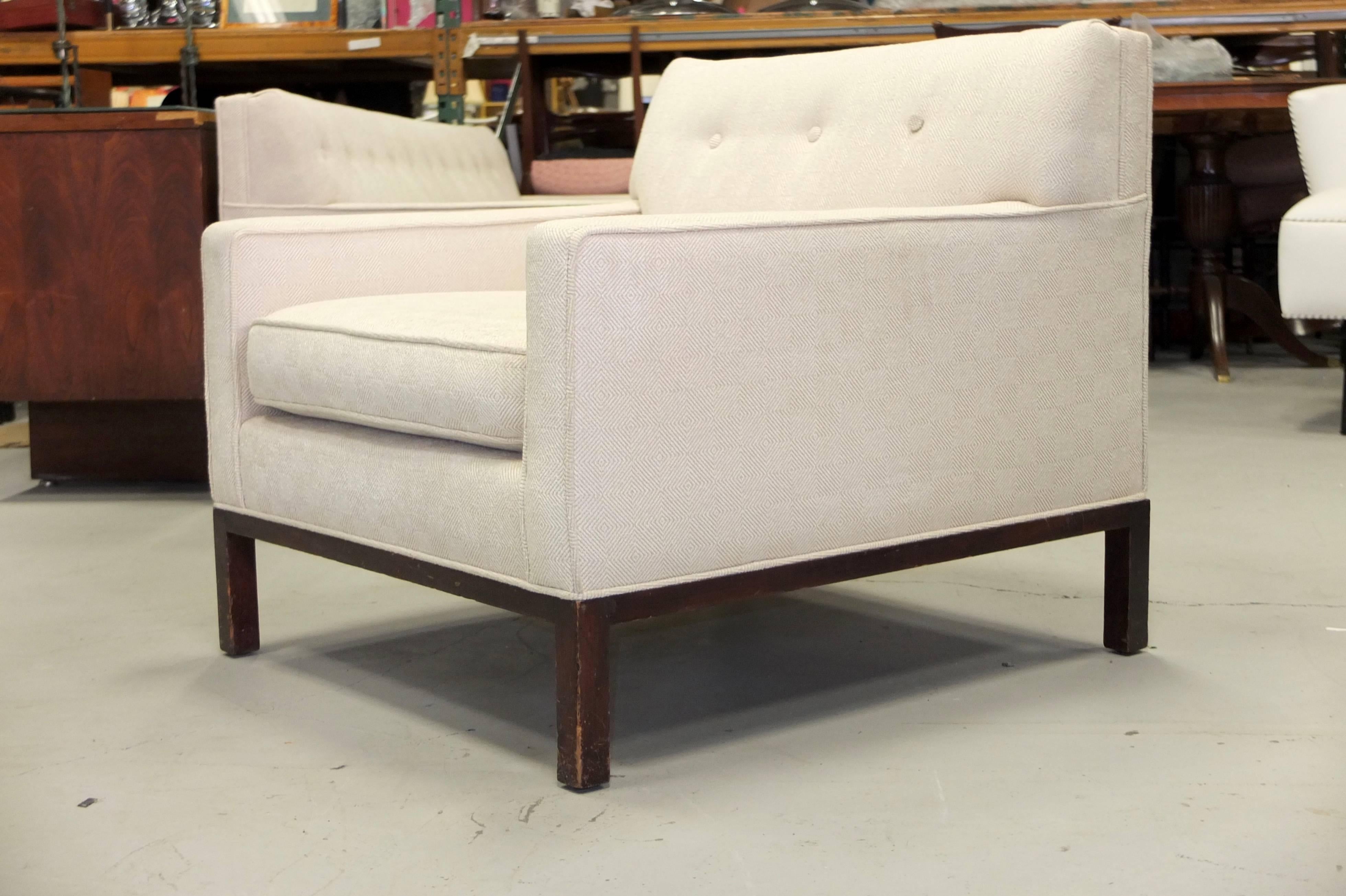 Harvey Probber lounge chair on mahogany stained walnut legs. Tight back with buttons.
Includes matching large-scale rectangular ottoman which is the size of a cocktail table.
We also have the matching sofa, listed separately.
All three pieces were