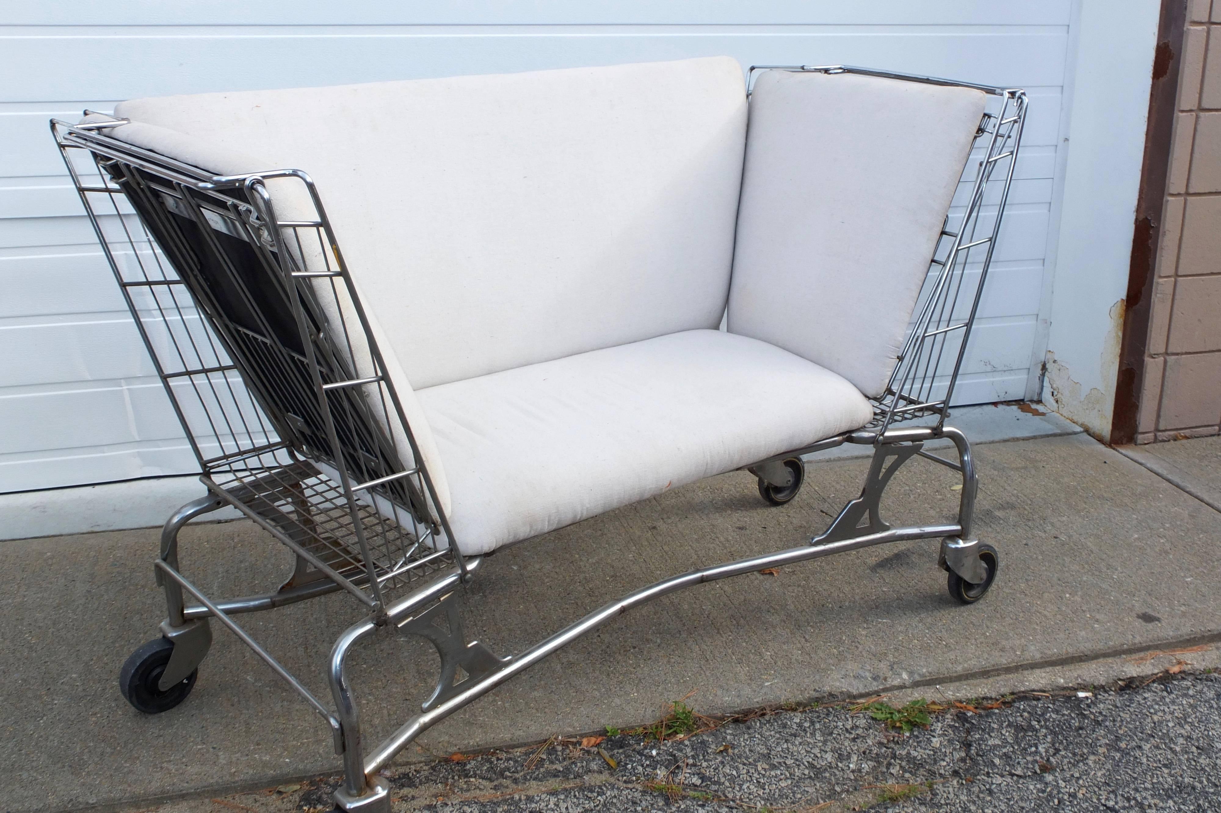 This is a one-of-a-kind creation salvage recycle of found objects by Industrial artist and welder, Doug Meyer, crafted by hand out of two vintage Mid-Century chromed steel shopping carts. 
Perfectly balanced, going and coming!
The seat, back and