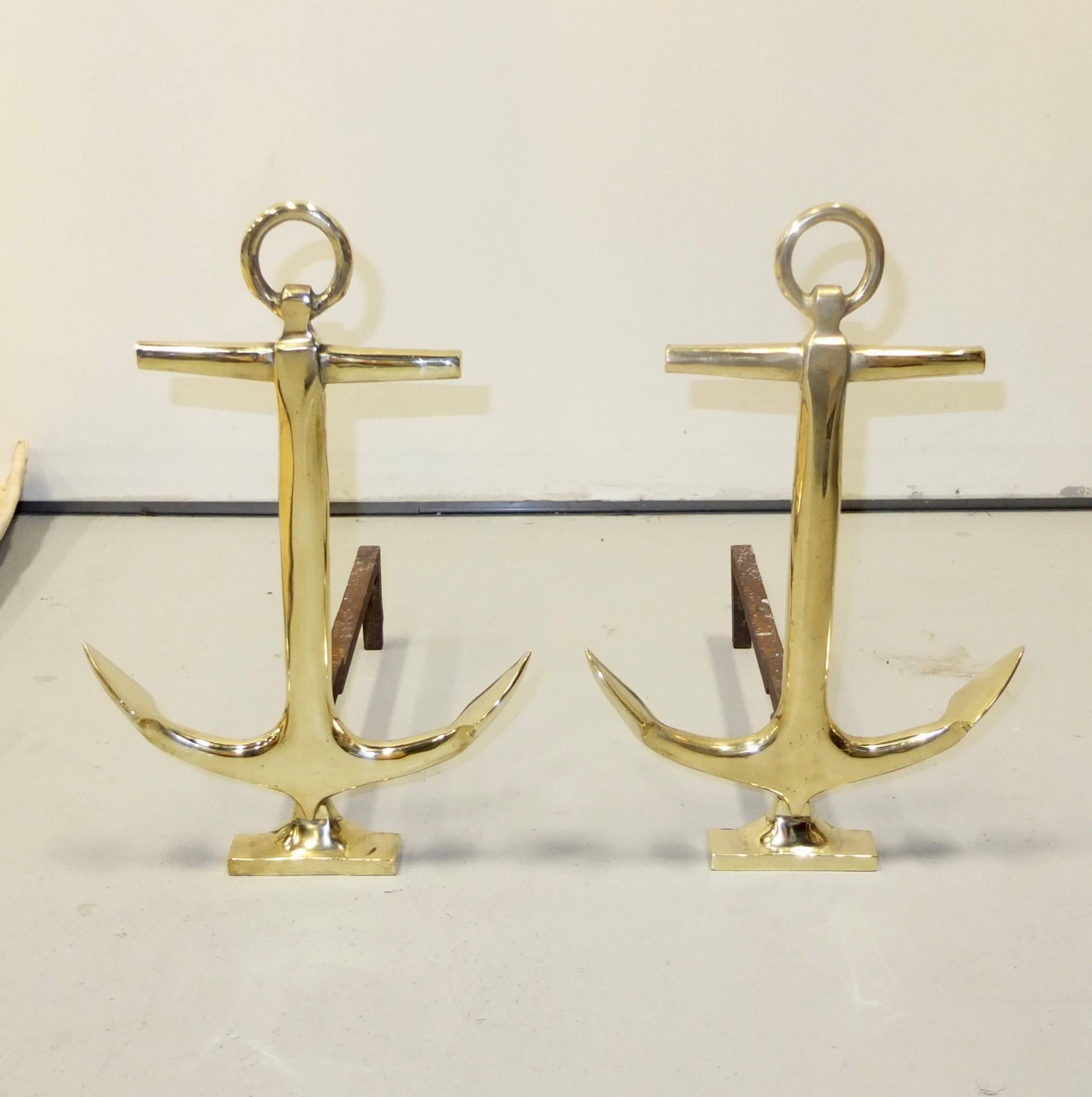Pair of vintage 1960's nautical themed brass andirons each in the form of a ships anchor.  By Puritan. 