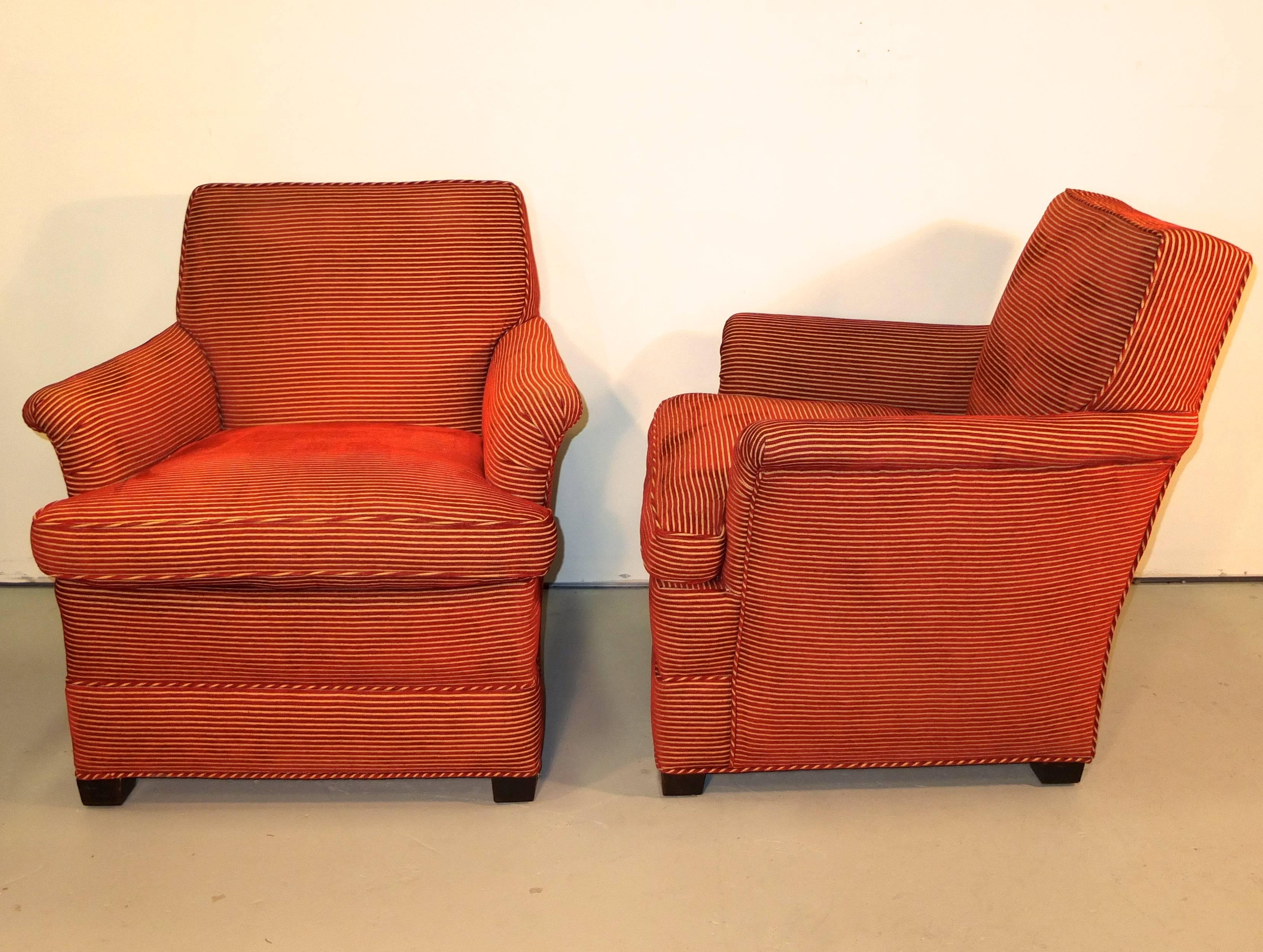 Pair of upholstered armchairs. Loose seat cushion, Mahogany feet. Classic comfort.

Inside seat dimensions 21