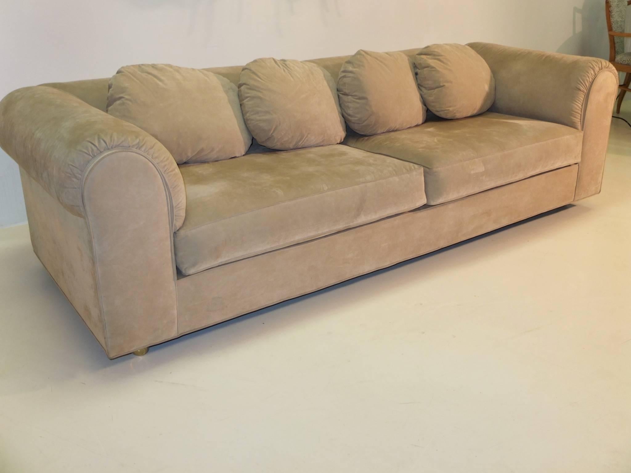 SATURDAY SALE (2/18)

A Dunbar upholstered sofa having a suede upholstered back, arms and seat, raised on brass casters. Dunbar printed decking.  Paper label from W & J Sloane.

The 7150 Harlow Lounge Sofa was designed by Edward Wormley for Dunbar