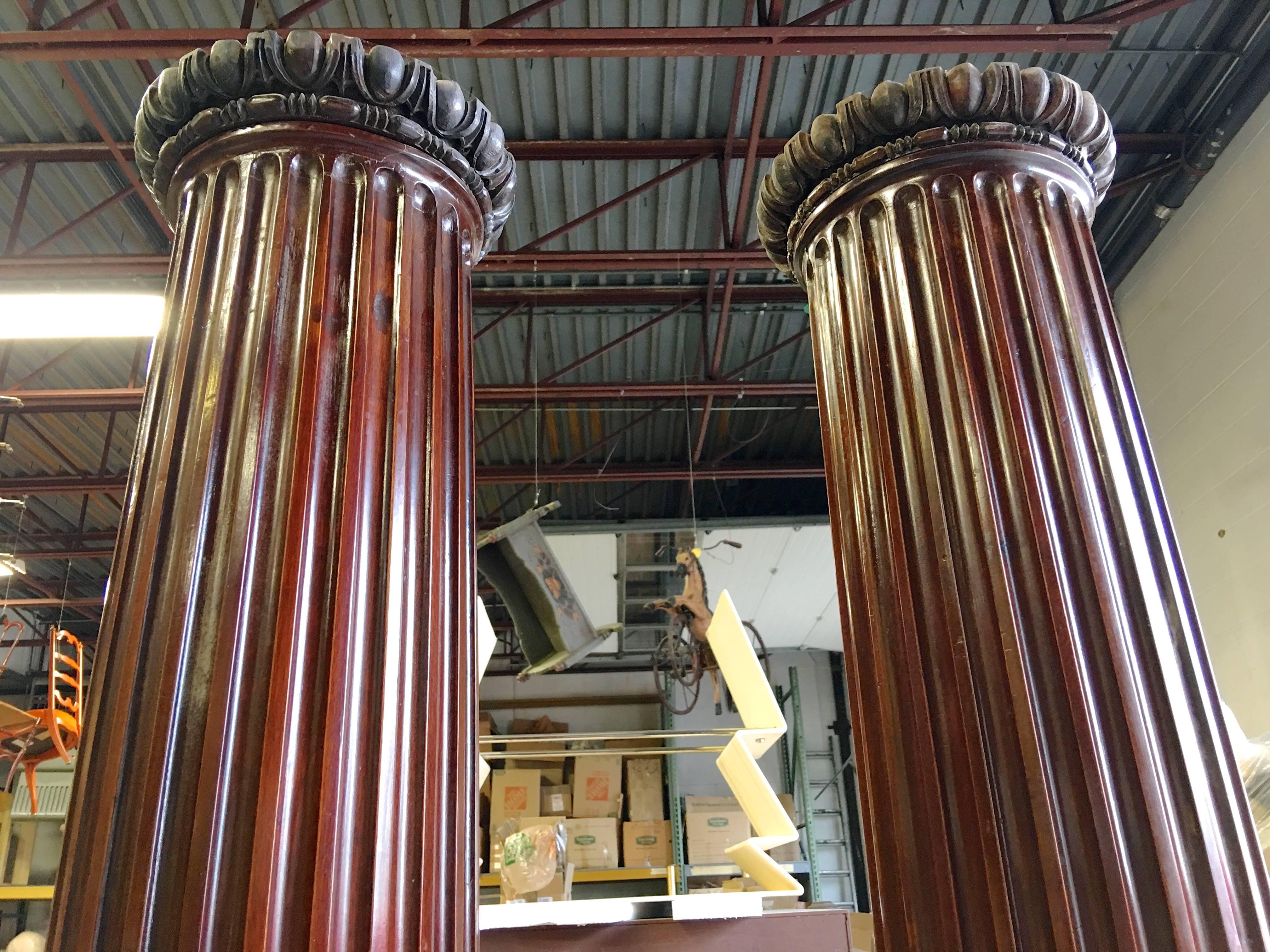 Pair of mid-19th century solid mahogany columns with egg and dart capitals. Measures: 8' 4
