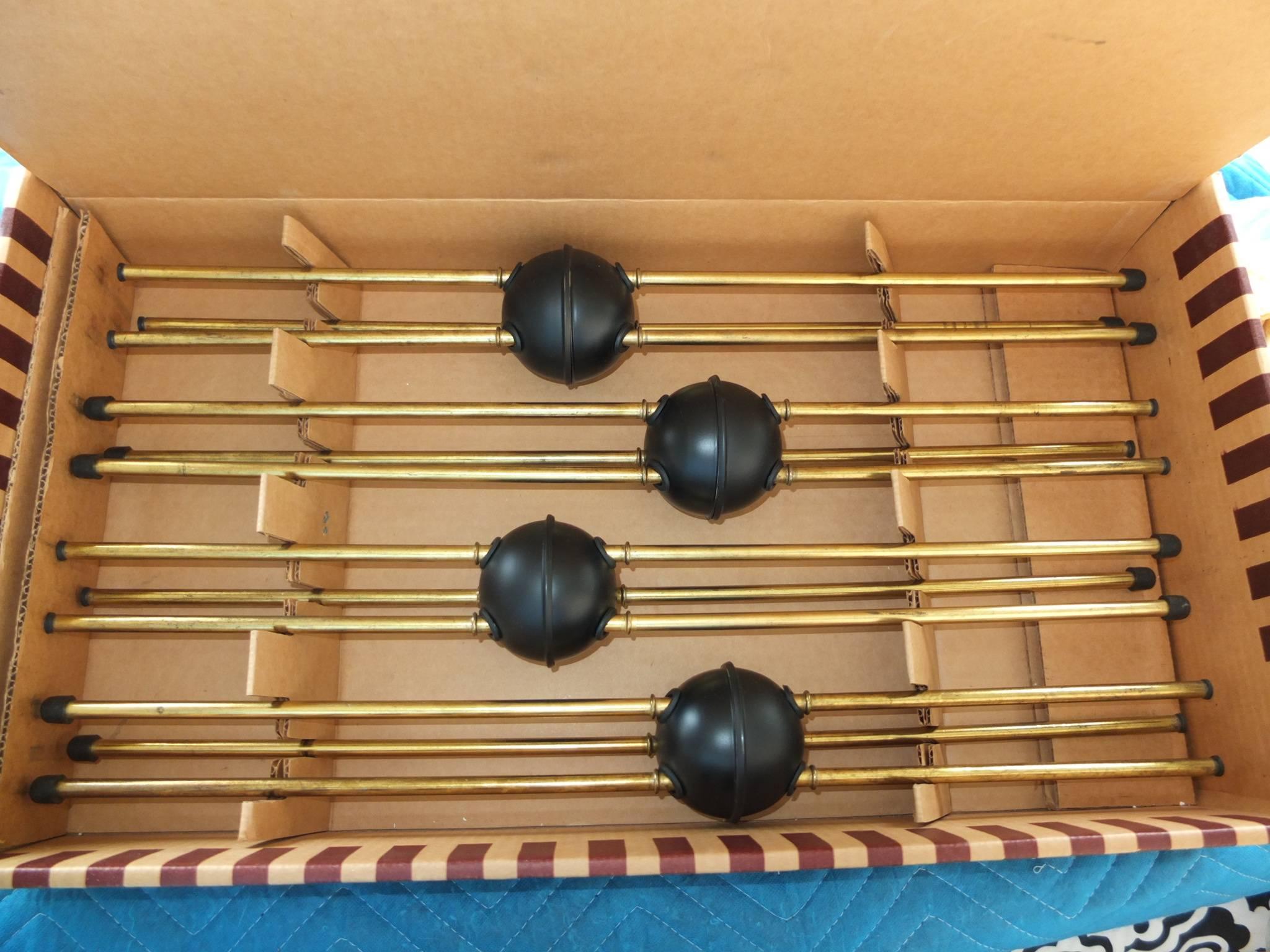 Enameled Set of Four Sputnik Tripod Tables