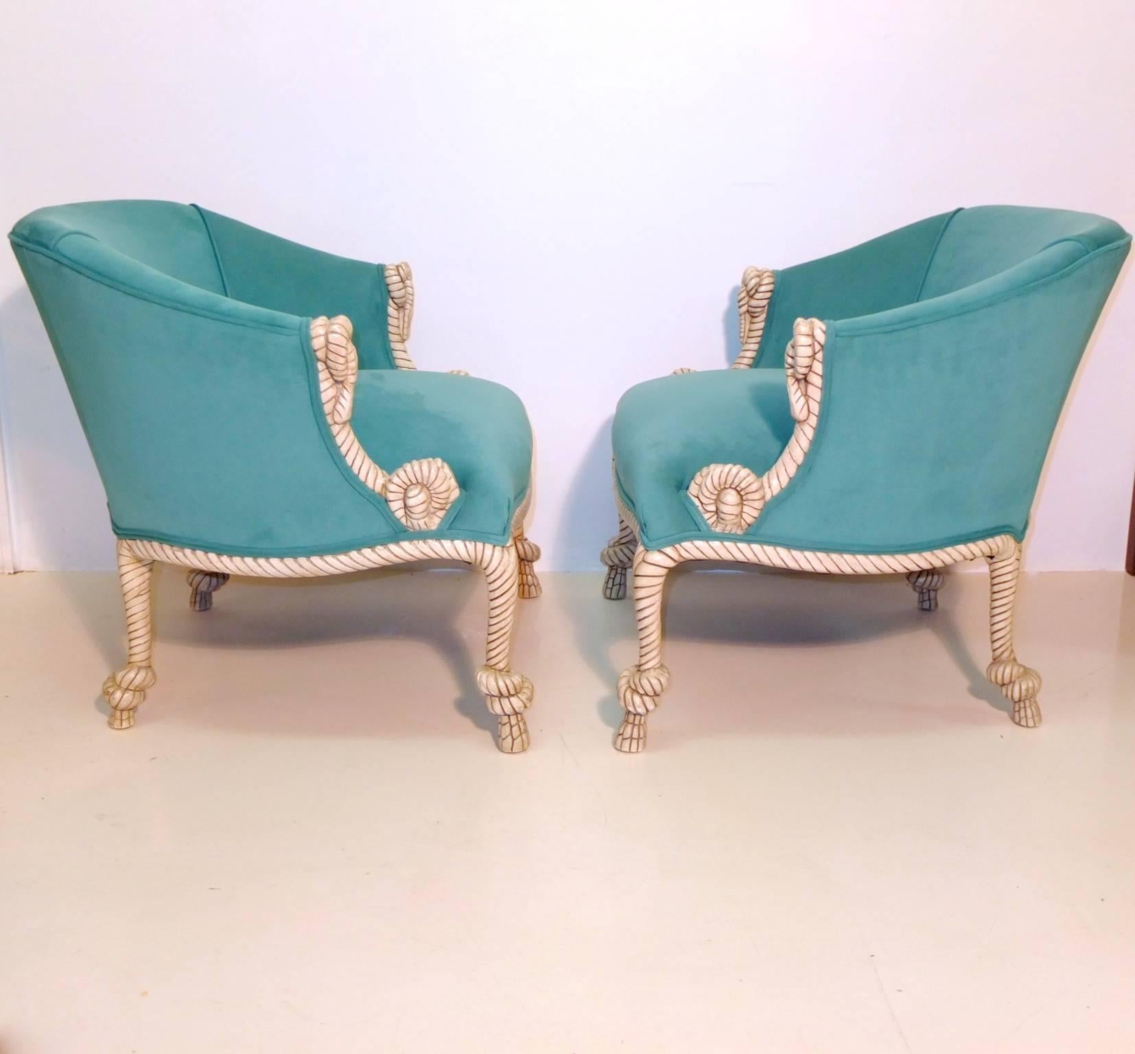 Two pairs or set of four 1960s barrel back armchairs with carved wood rope and tassel motif descended from the Napoleon III taste of A.M.E. Fournier reborn with the curvilinear Rococo whimsy characteristic of the Hollywood Regency. 

These chairs