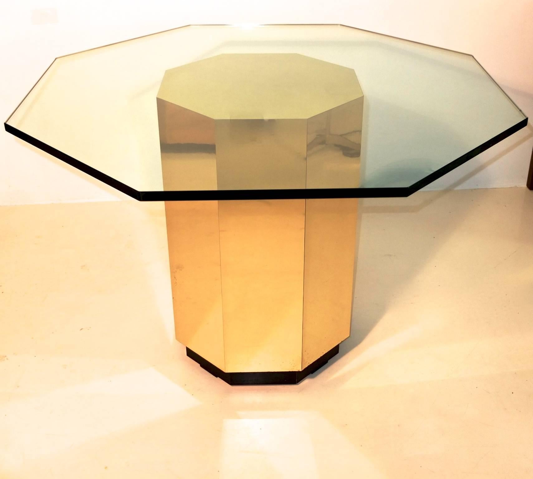 Mastercraft brass clad octagonal form pedestal drum dining table base with ebonized recessed wood plinth and brass top. Measures: 18