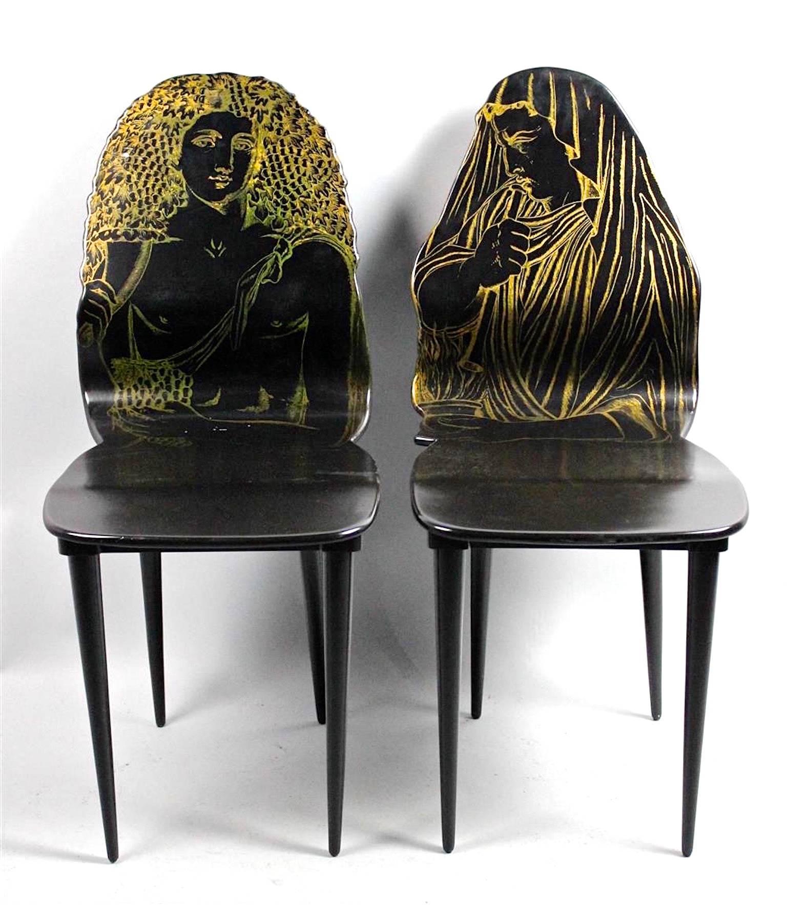 Pair of 1950's edition chairs by Piero Fornasetti from the Quattro Stagione series. Signed Fornasetti Milano. Black and gold lithographically printed.
Inverno and Autunno.

Authenticated by Barnaba Fornasetti as original first production. 