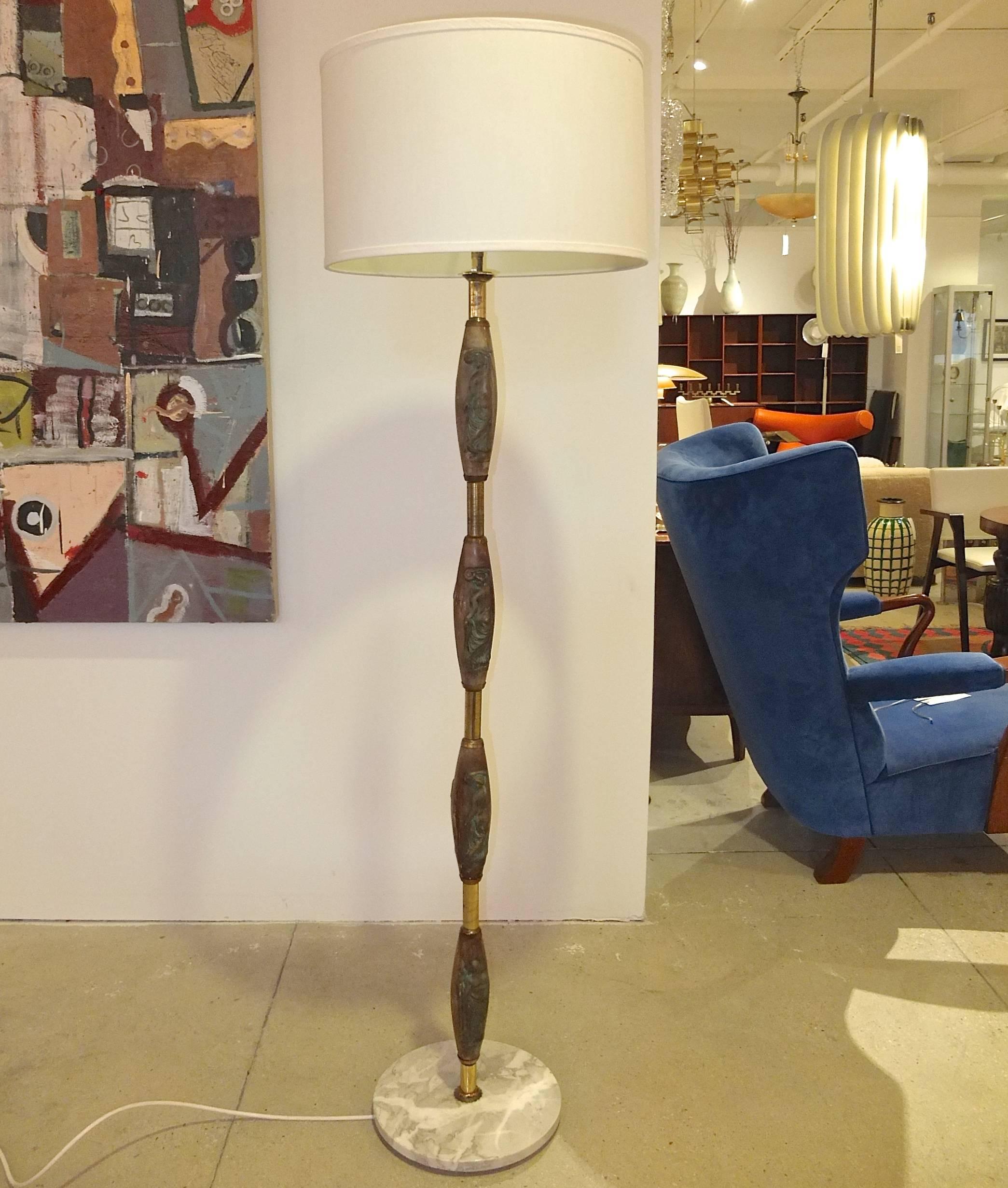 1940s, Italian, Art Deco floor lamp with bronze tone figural porcelain ornaments and brass fittings on a round marble base, available with original ornate shade (see last detail image). Measures: 69