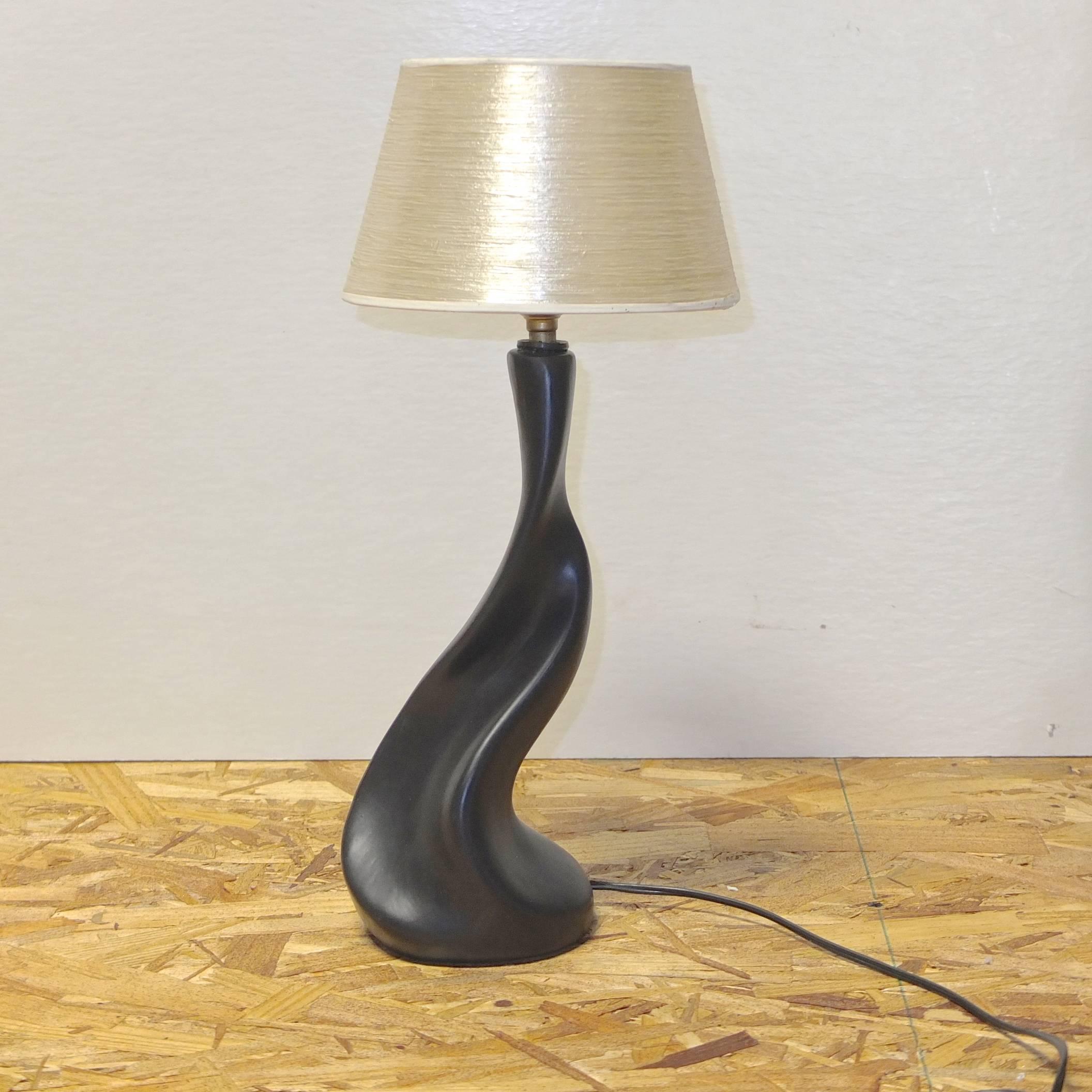 Vintage French black ceramic lamp from Vallauris in the organic style of French ceramicist, Georges Jouve. The lines of this lamp flow freely like licorice salt water taffy in an irregular spiral form.

Rewired with switch on cord. Your choice of