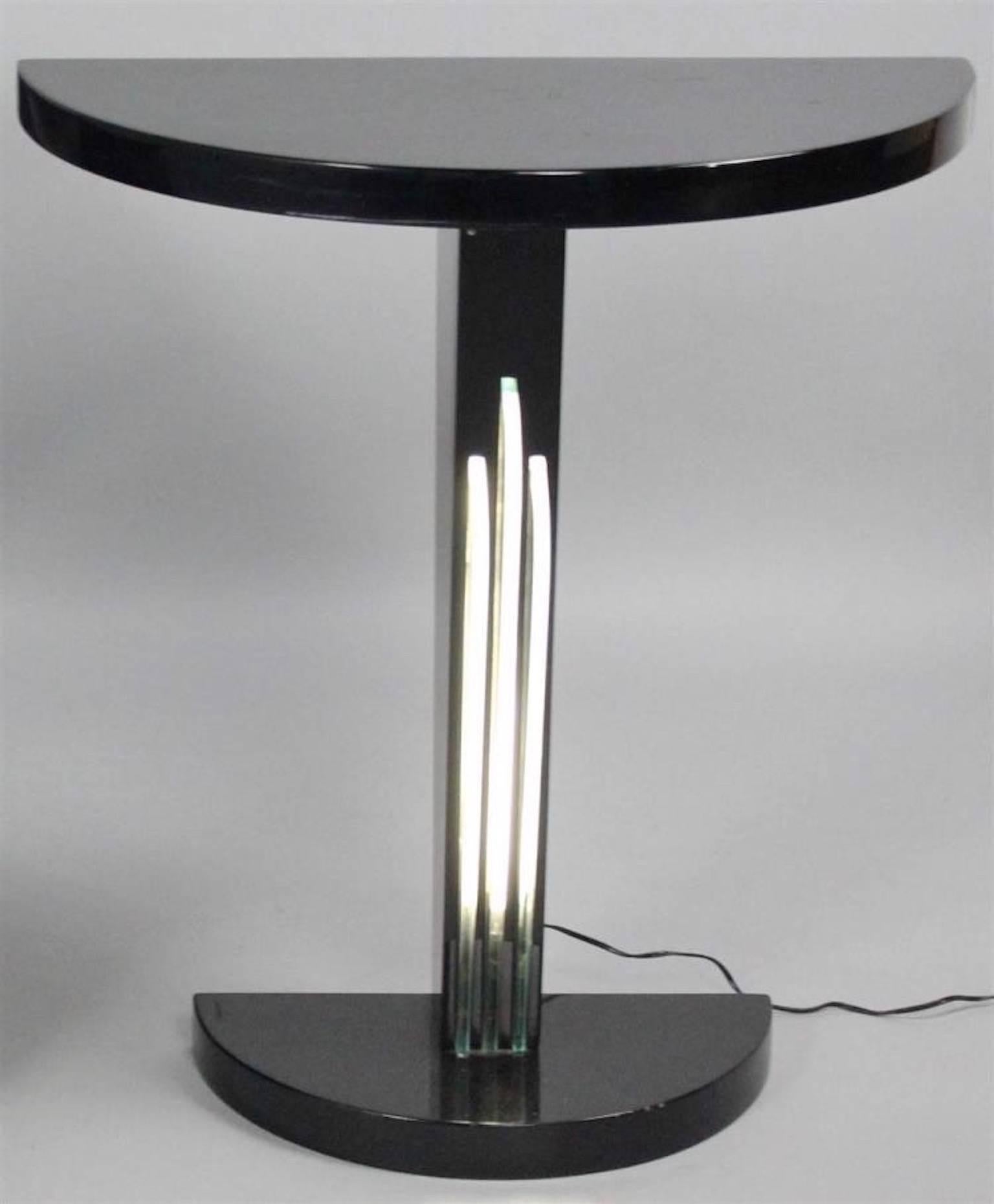 Custom demilune console table designed by Juan Montoya for a published 1990 residential interiors project in Georgetown, DC. Fabricated by Jan Gerard. 

Black lacquered demilune top above an angled support with three curved glass elements in