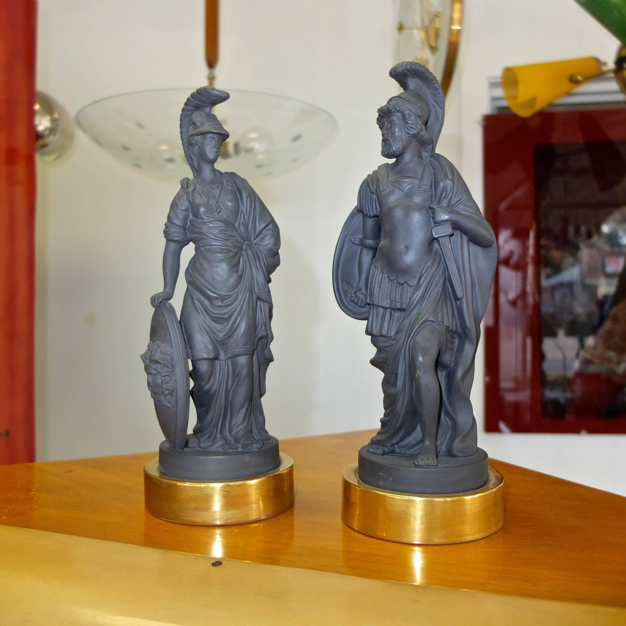 Mottahedeh basalt ceramic classical figures of Jupiter and Minerva, both bearing shields with the head of Medusa.

Ceramic with black basalt finish and gilt glazed base. Both figurines are marked on the underside with Mottahedeh / Italy.