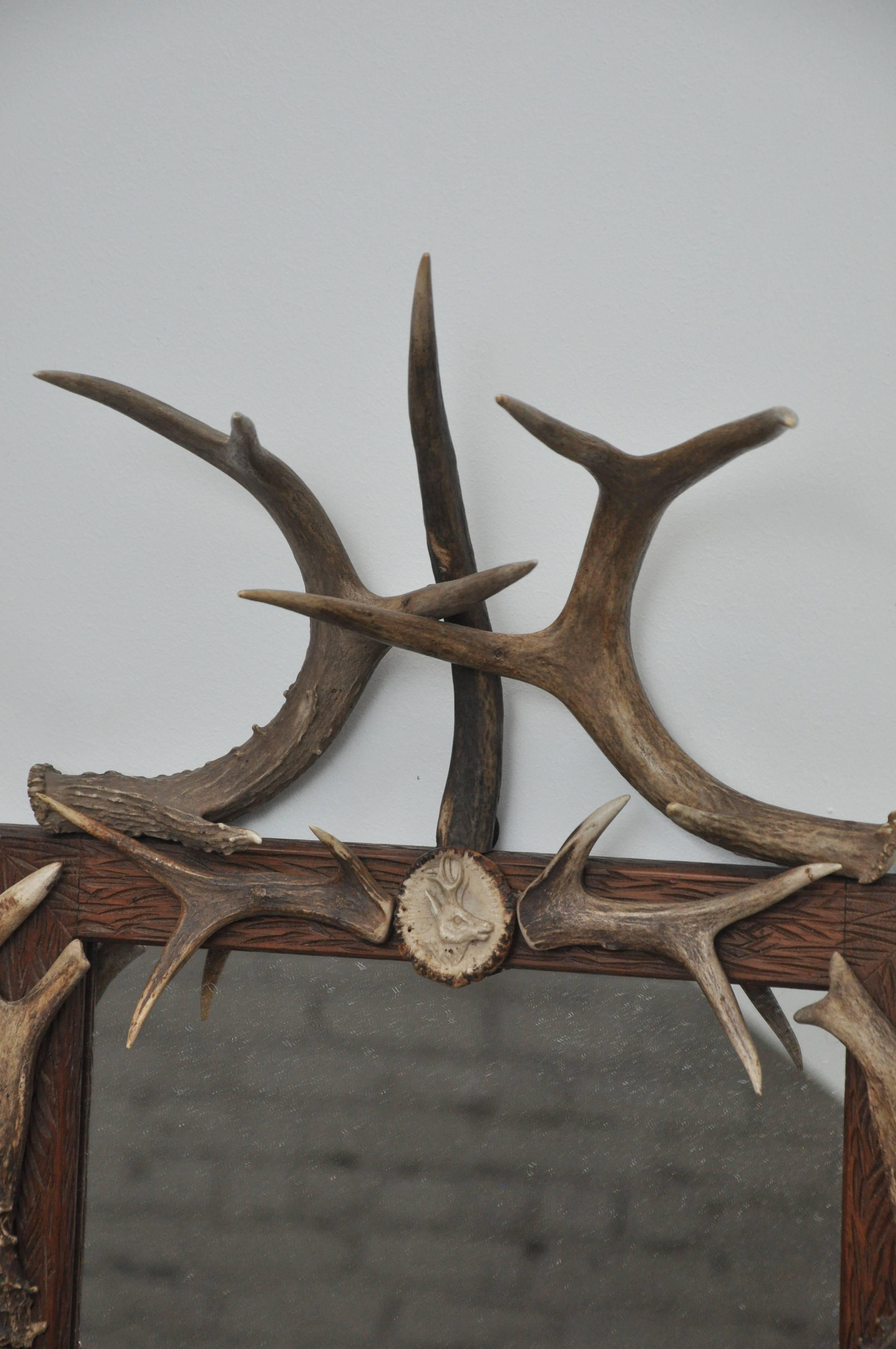 17th century pair of antler mirrors. Found in Bavarian Hunting Lodge. Handsome pair of antler mirrors in mint condition. Handmade, each unique in design.

Dimensions: 19